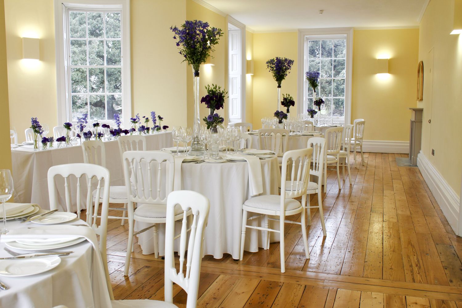 Elegant event space in Clissold House with round tables, ideal for receptions and gatherings.