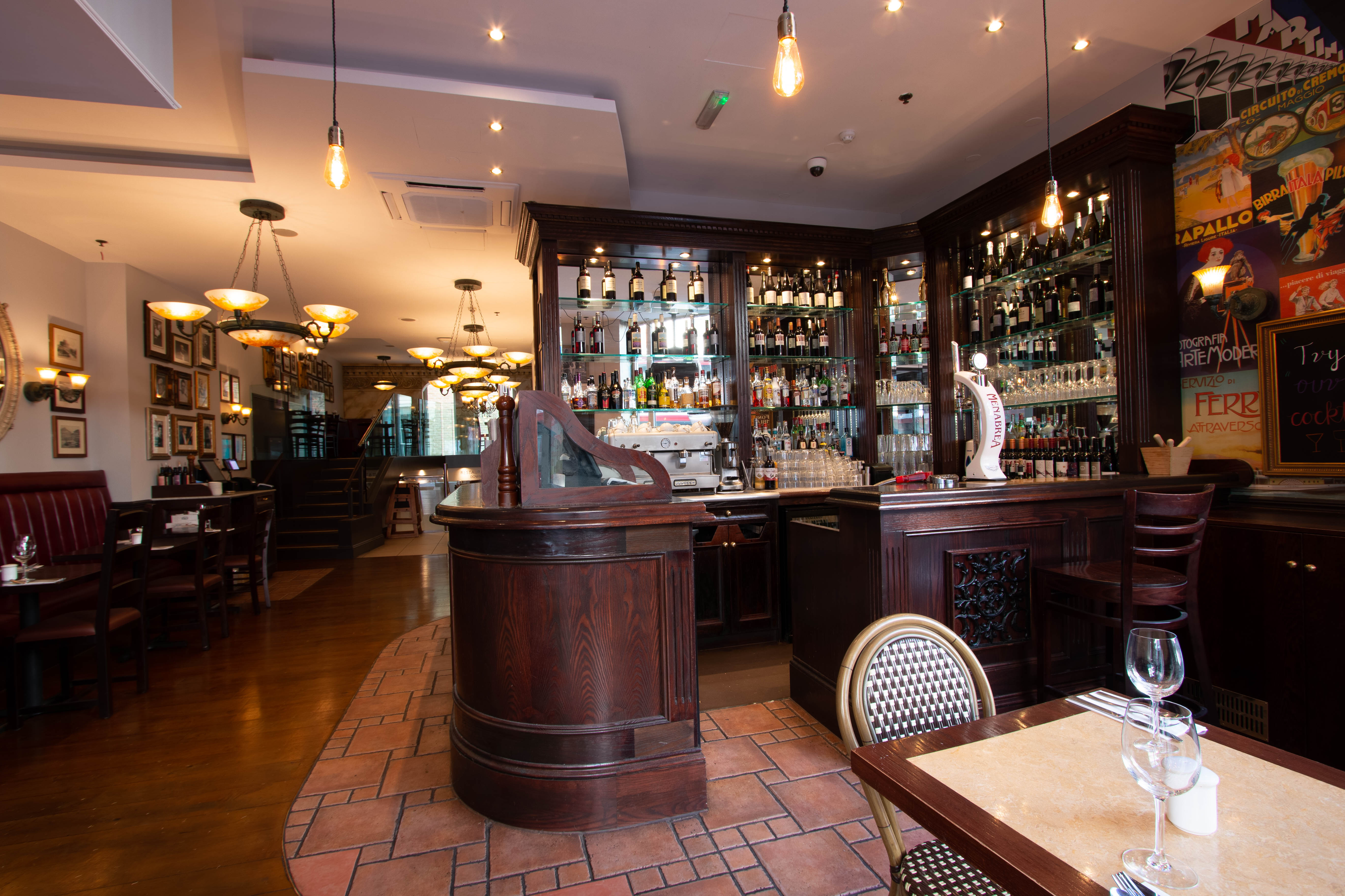 Stylish Bella Italia Strand restaurant interior with polished bar, ideal for events.