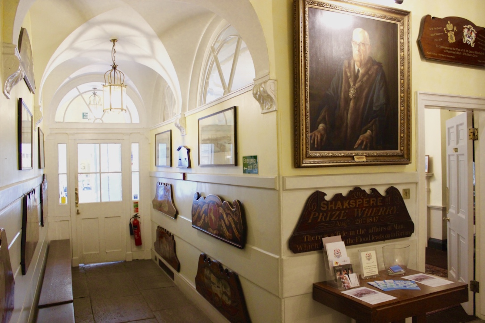 Parlour Room at Watermen's Hall, bright corridor with historical art, perfect for events and workshops.