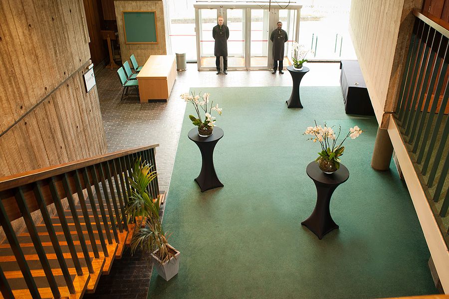Huxley Theatre entryway with floral decor, ideal for events and networking at ZSL London Zoo.