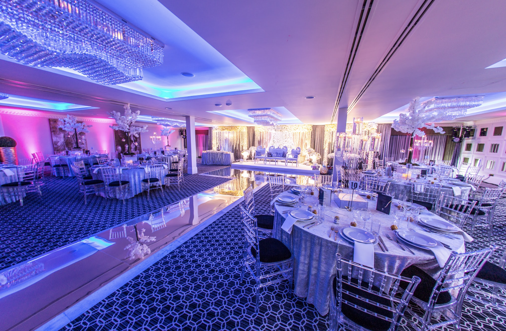 Alan Turing at an elegant event space with chandeliers, perfect for weddings and galas.
