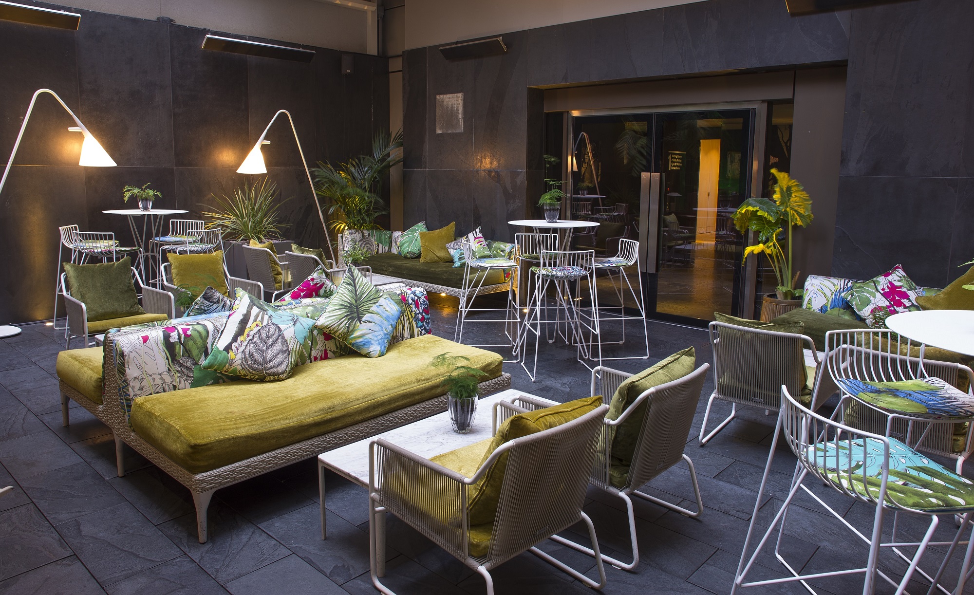 Stylish lounge in The Secret Garden, South Place Hotel, ideal for networking events.