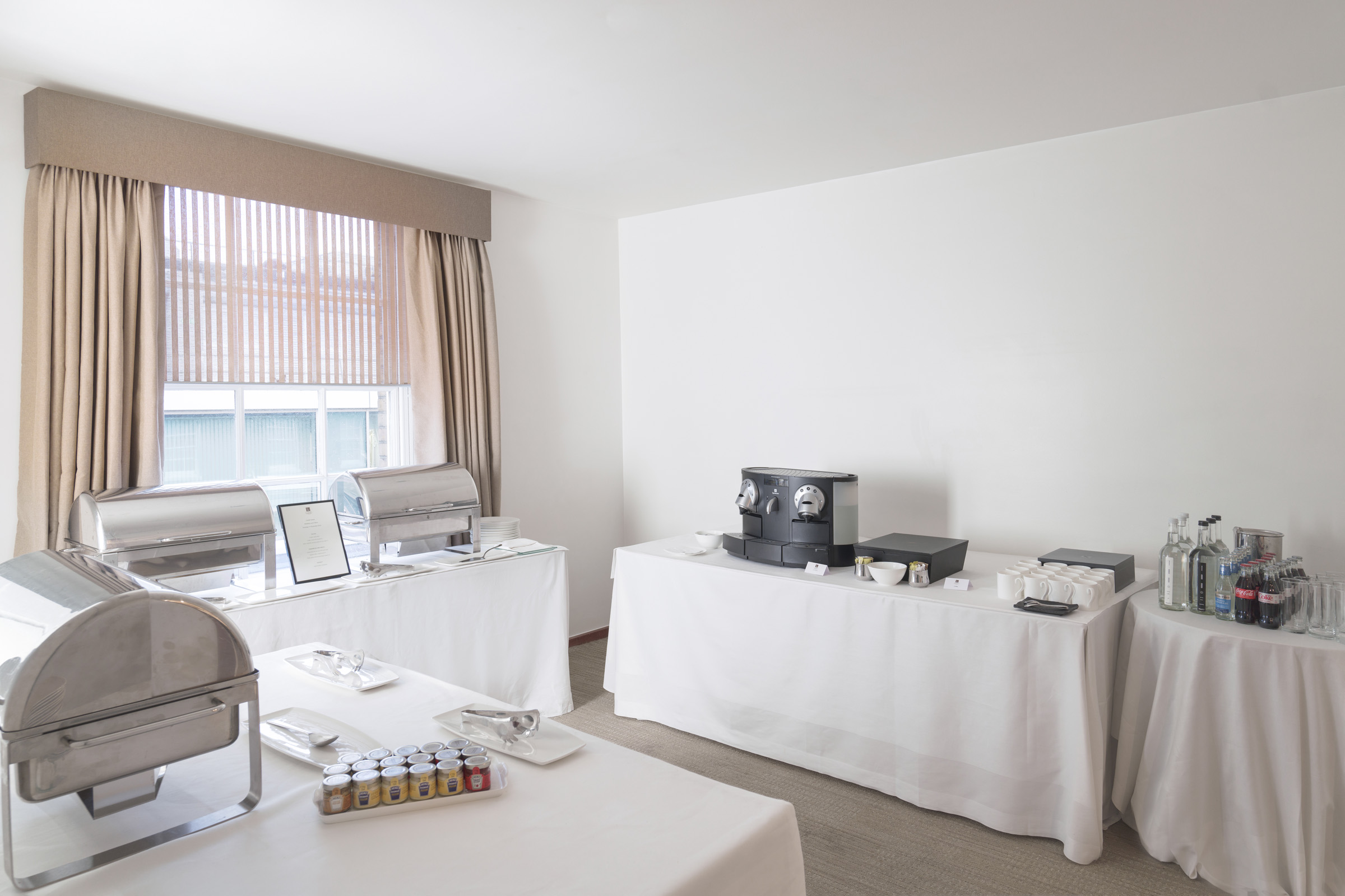 Catering setup with chafing dishes at COMO Metropolitan London for events and meetings.