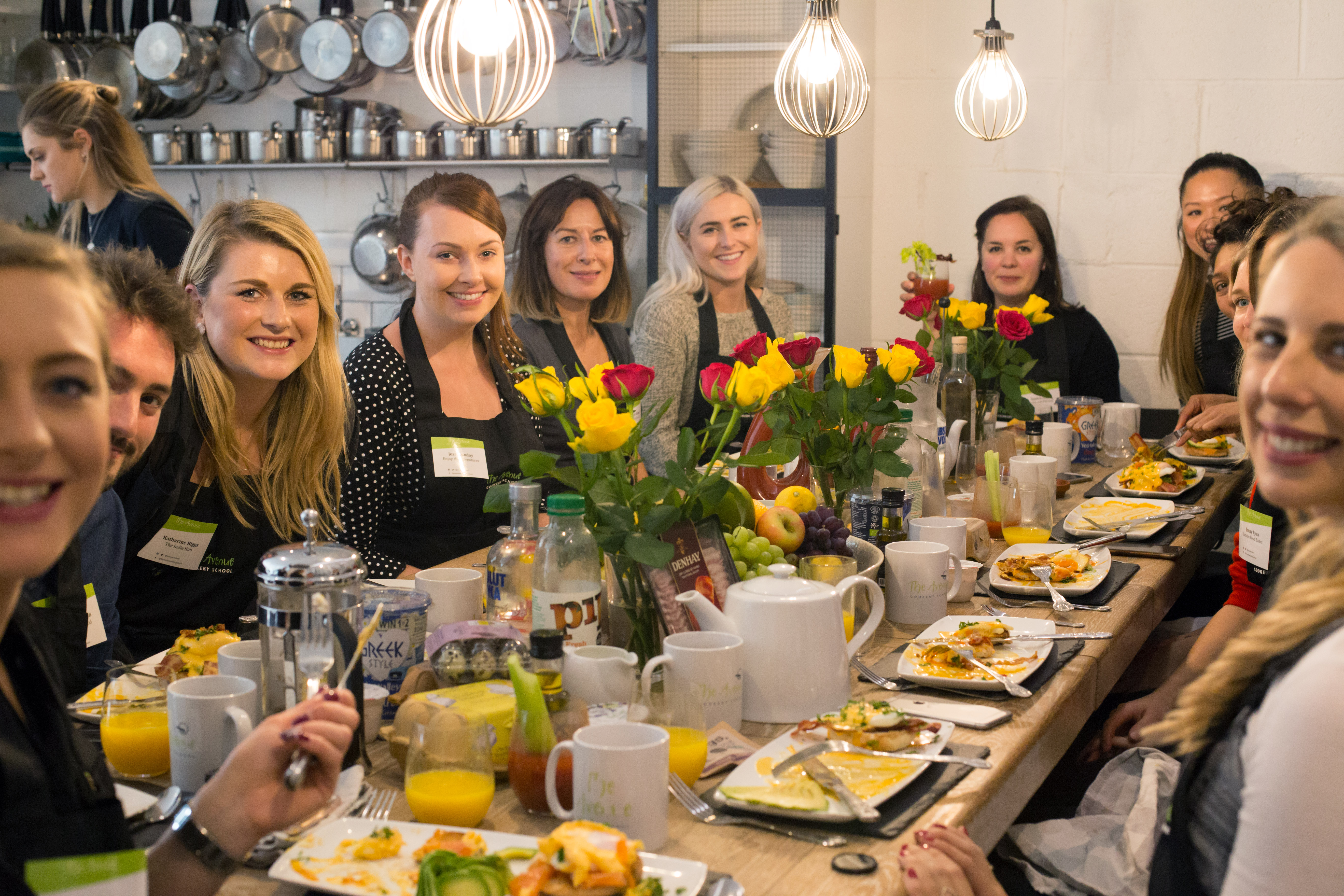 Professional kitchen rental for breakfast meetings with vibrant decor and networking focus.