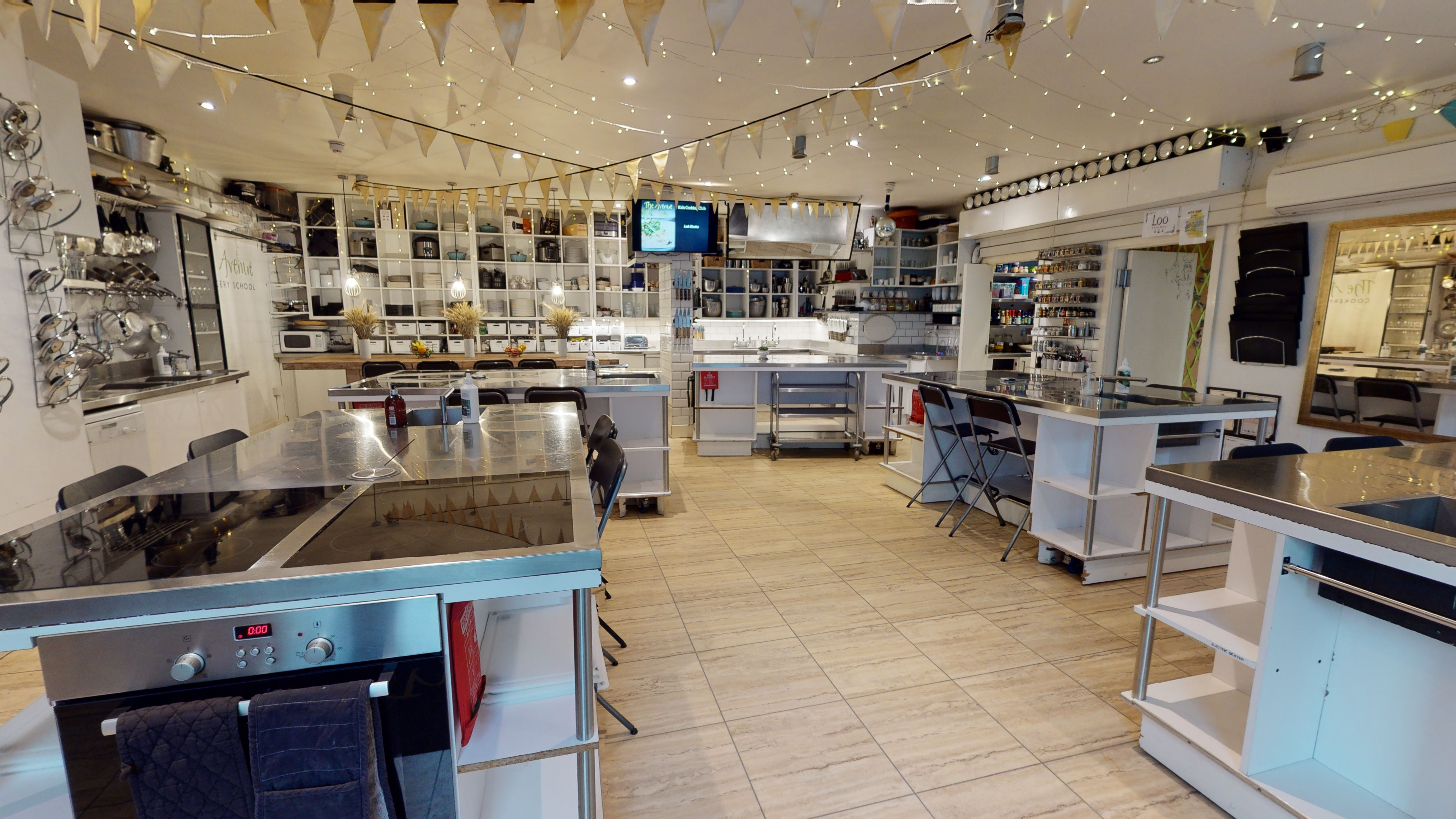 Modern kitchen for rent, ideal for culinary events and workshops with sleek countertops.