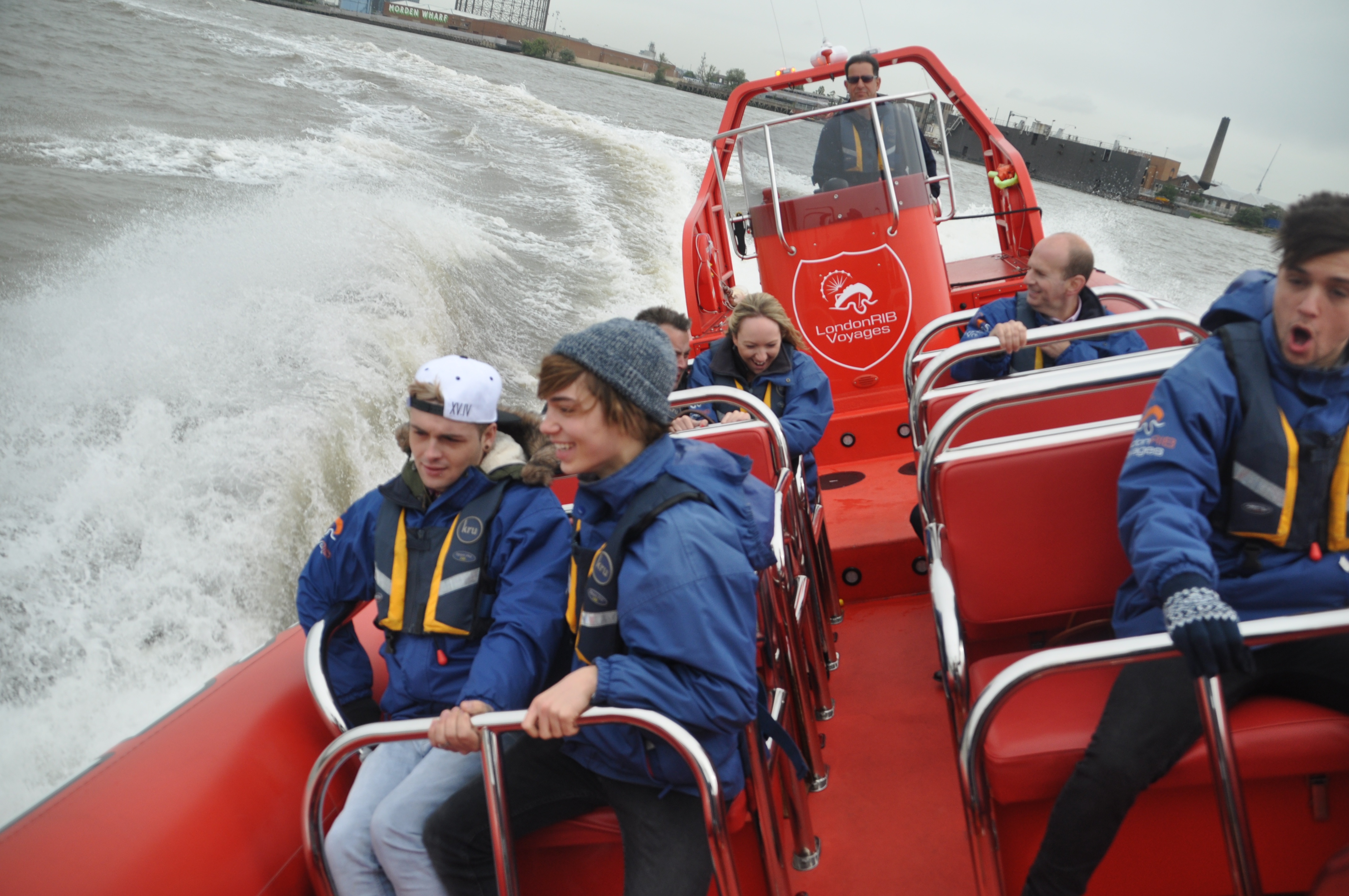 Thames Rockets RIB boat on high-speed city tour, ideal for corporate events and team building.