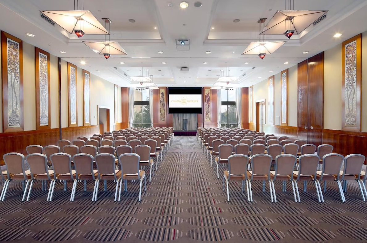 Ballroom at Canary Riverside Plaza Hotel, modern decor for conferences and seminars.