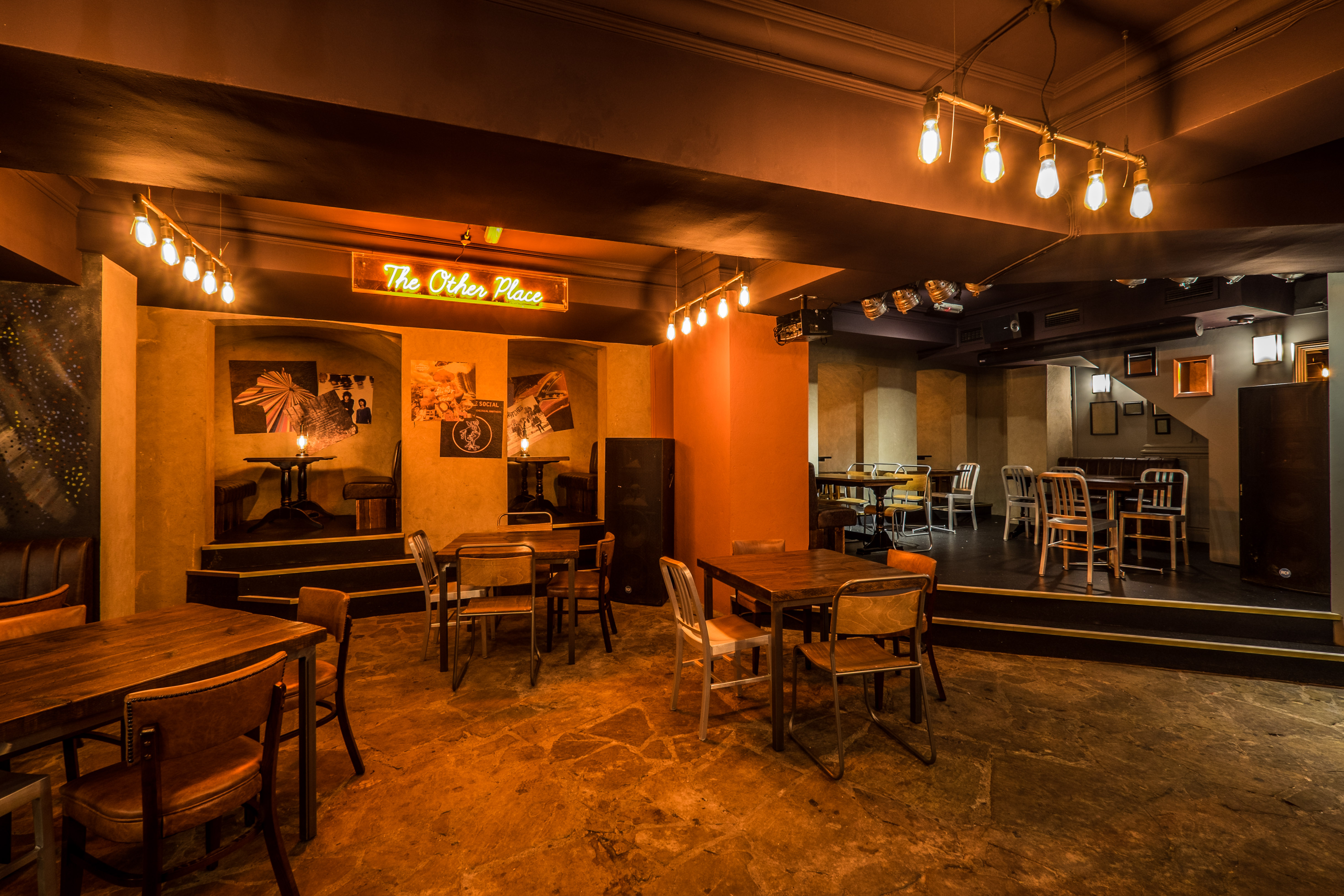 Intimate event space at The Other Place, warm lighting, ideal for workshops and gatherings.