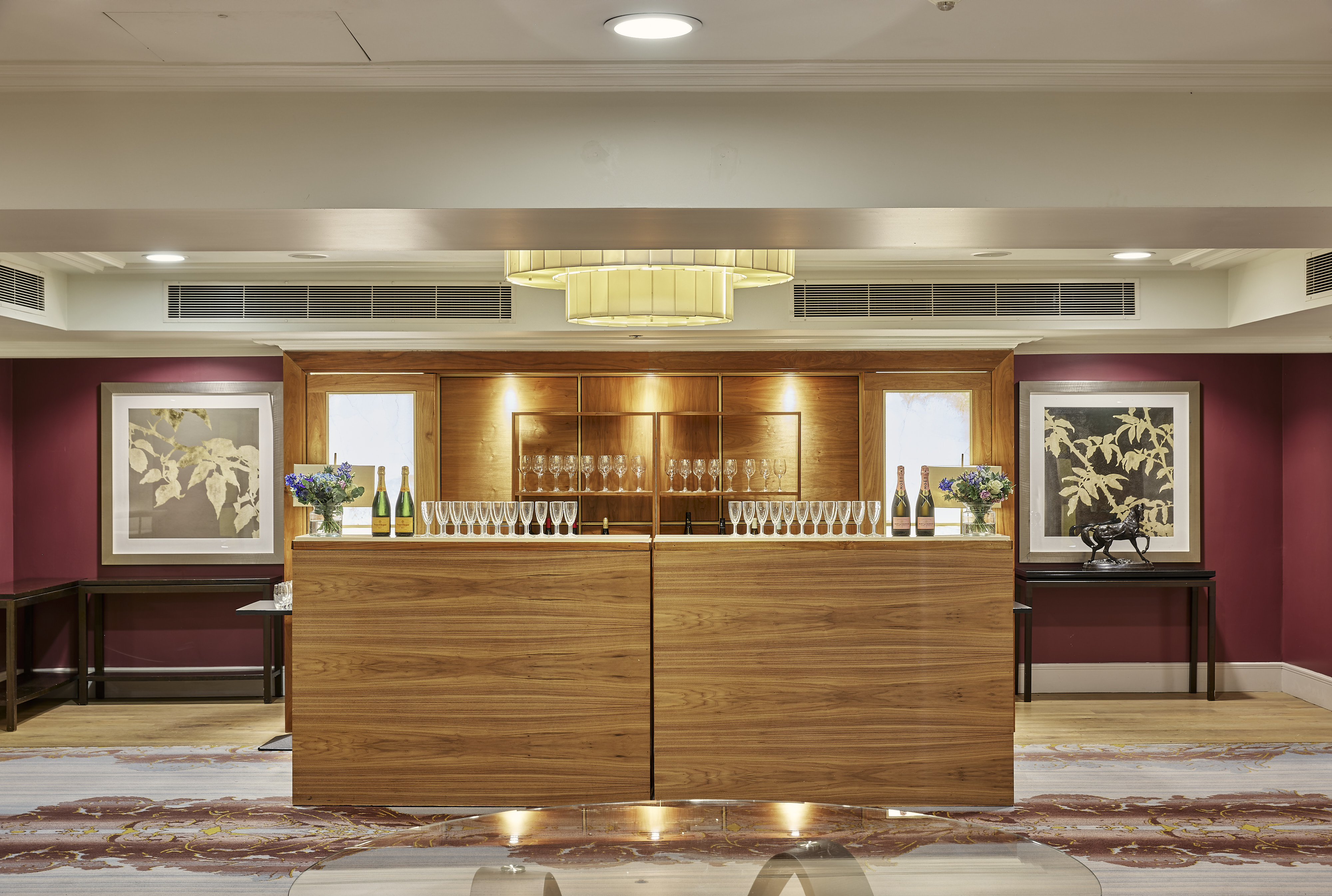 Westminster Suite at Sofitel London: elegant event space with wooden bar for receptions.