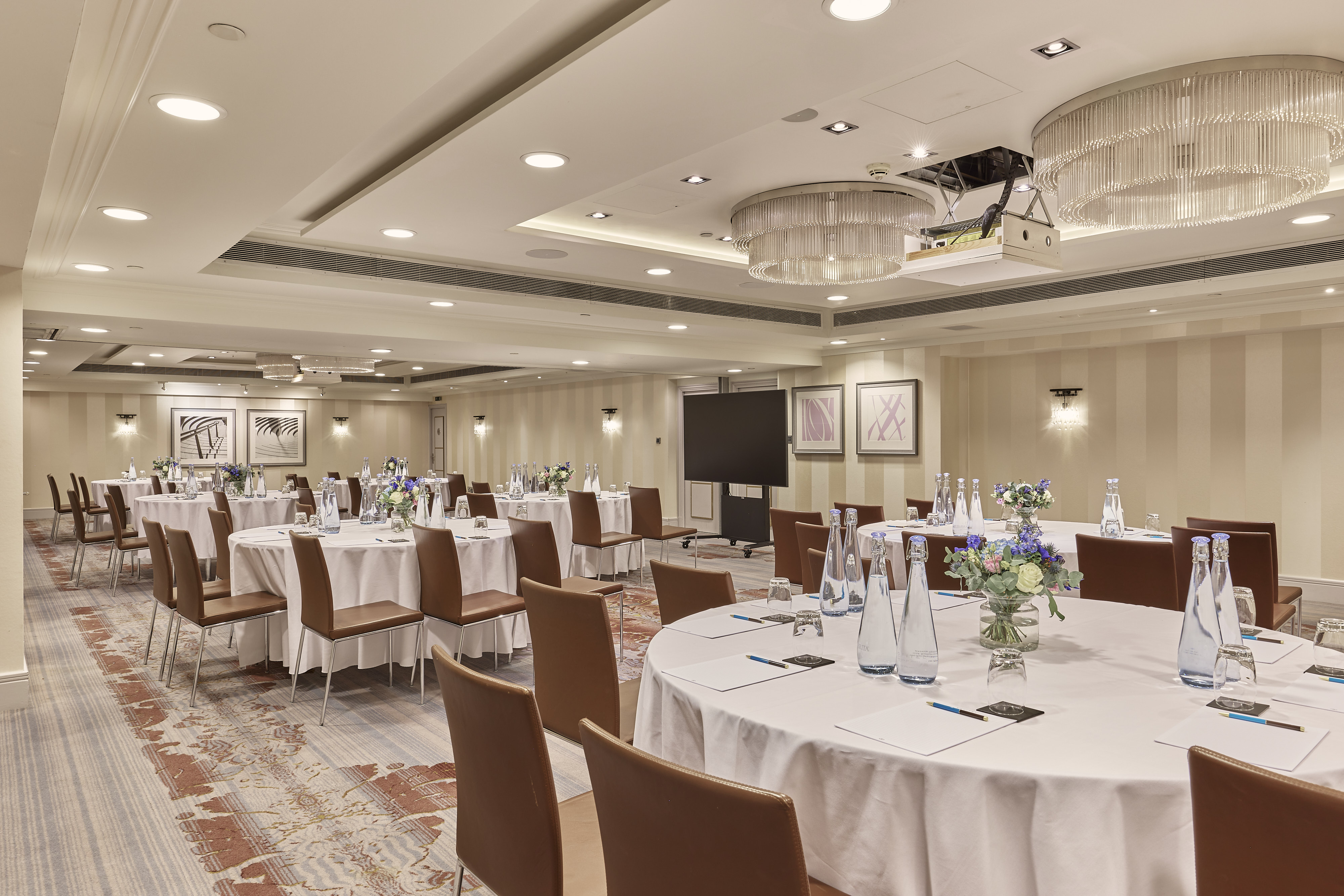 Mayfair Suite at Sofitel London: elegant meeting room for corporate events with modern AV.
