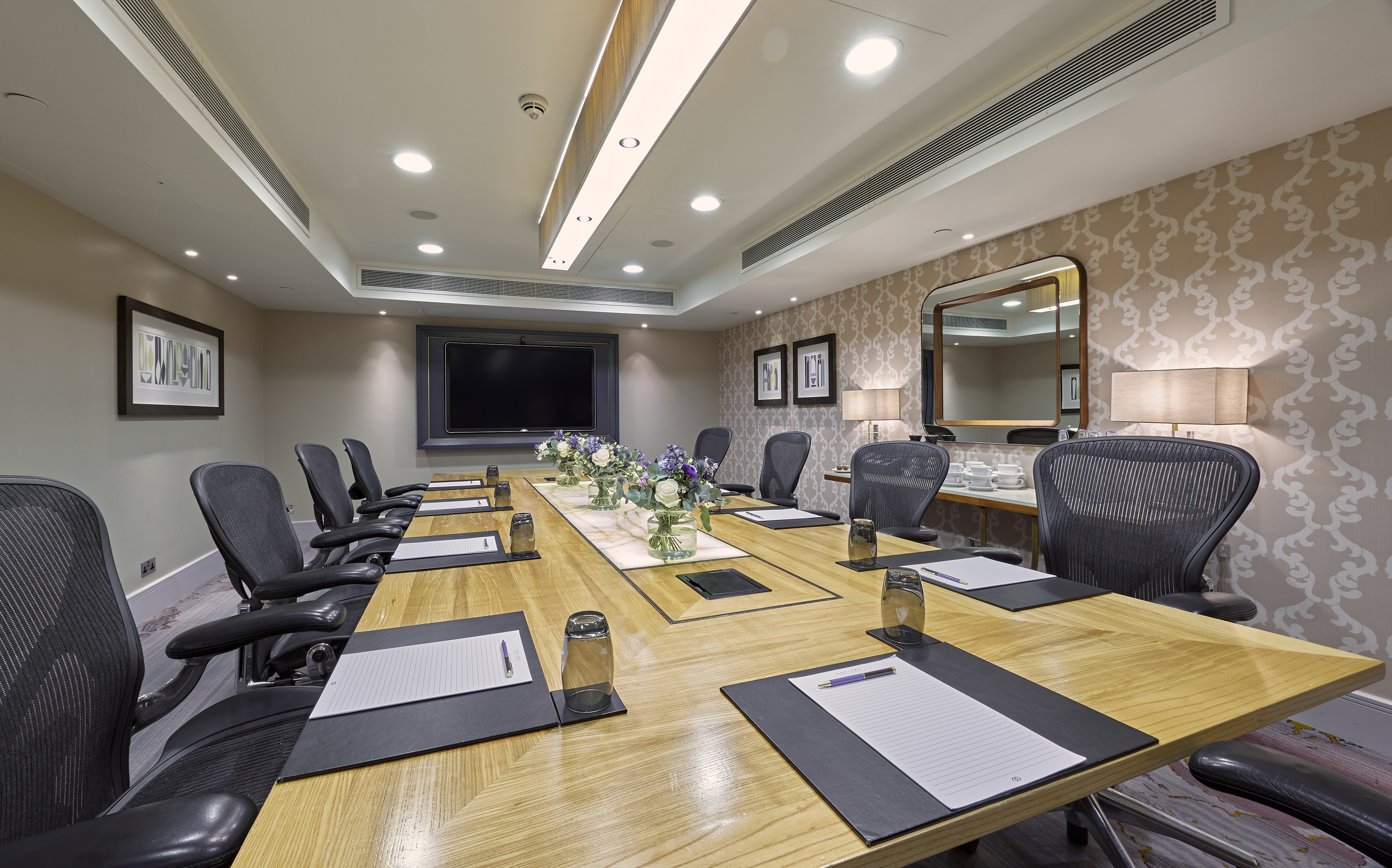 Belgravia meeting room at Sofitel London, modern design for professional events.