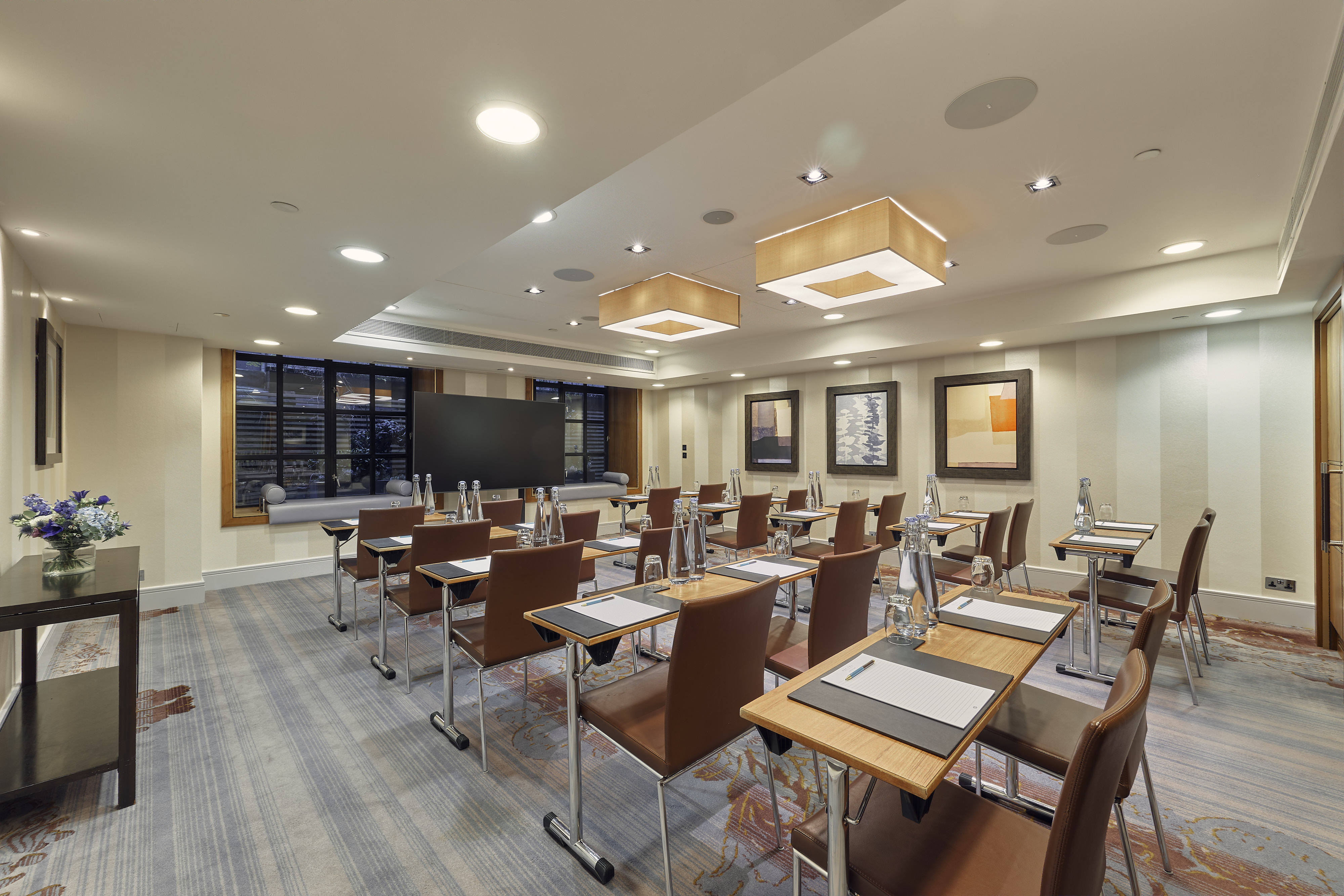 Modern meeting room at Sofitel London St James, perfect for corporate events and training.