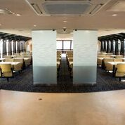 Modern meeting space with glass partitions for corporate events and collaboration.