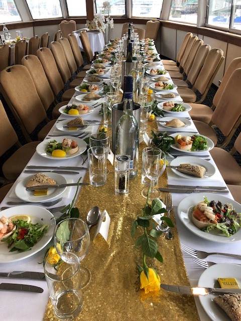 M.V. Westminster banquet table with gourmet seafood for formal dining event.