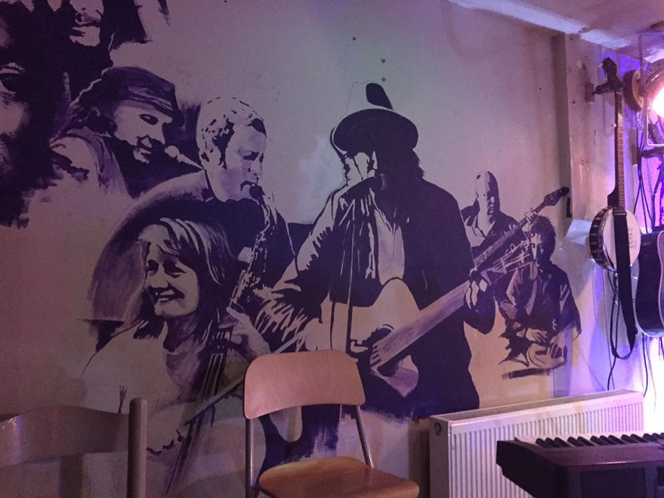 Vibrant mural at The Tower of Song venue, perfect for events and networking.