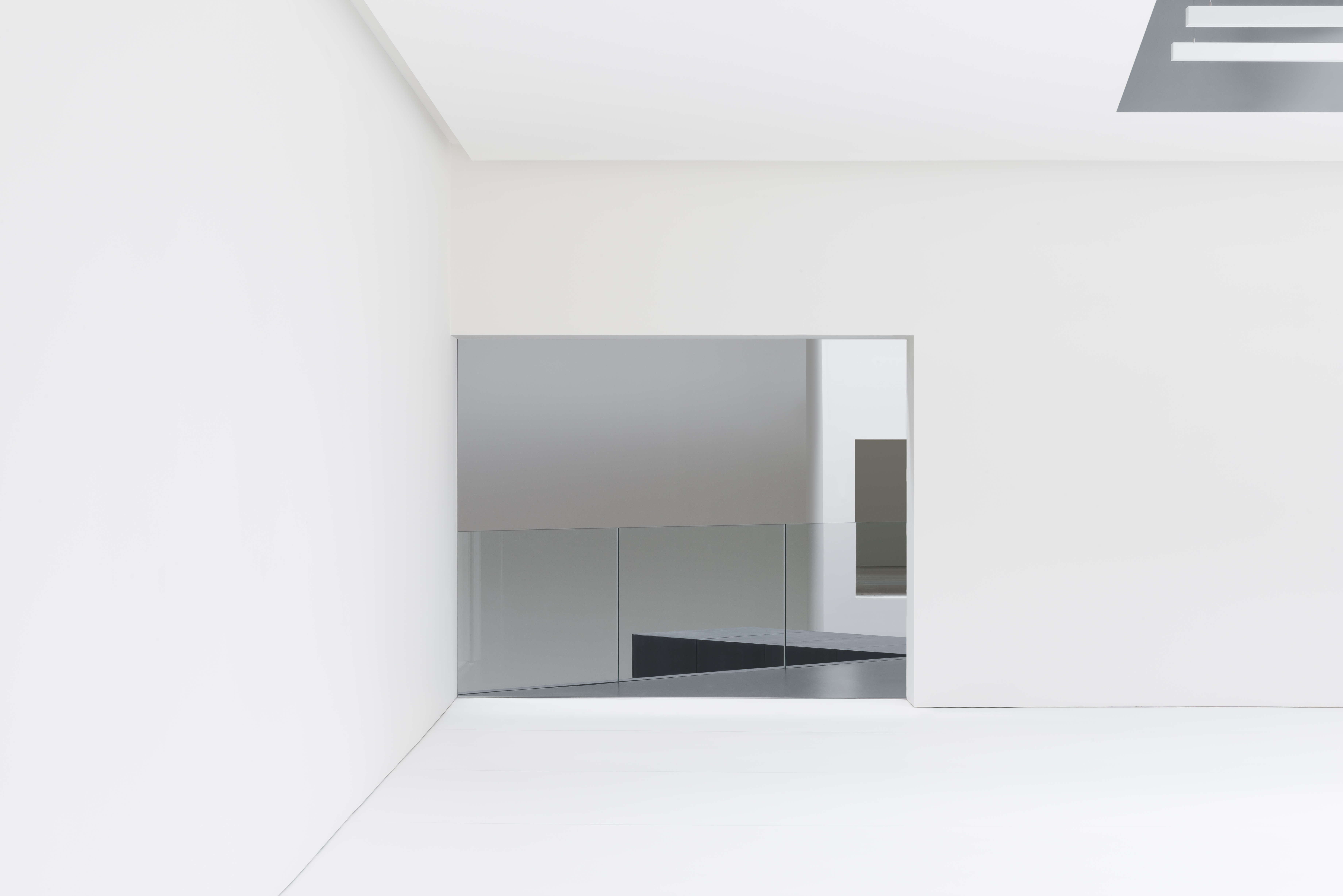 Minimalist meeting space in Studio Wayne McGregor, perfect for workshops and brainstorming.