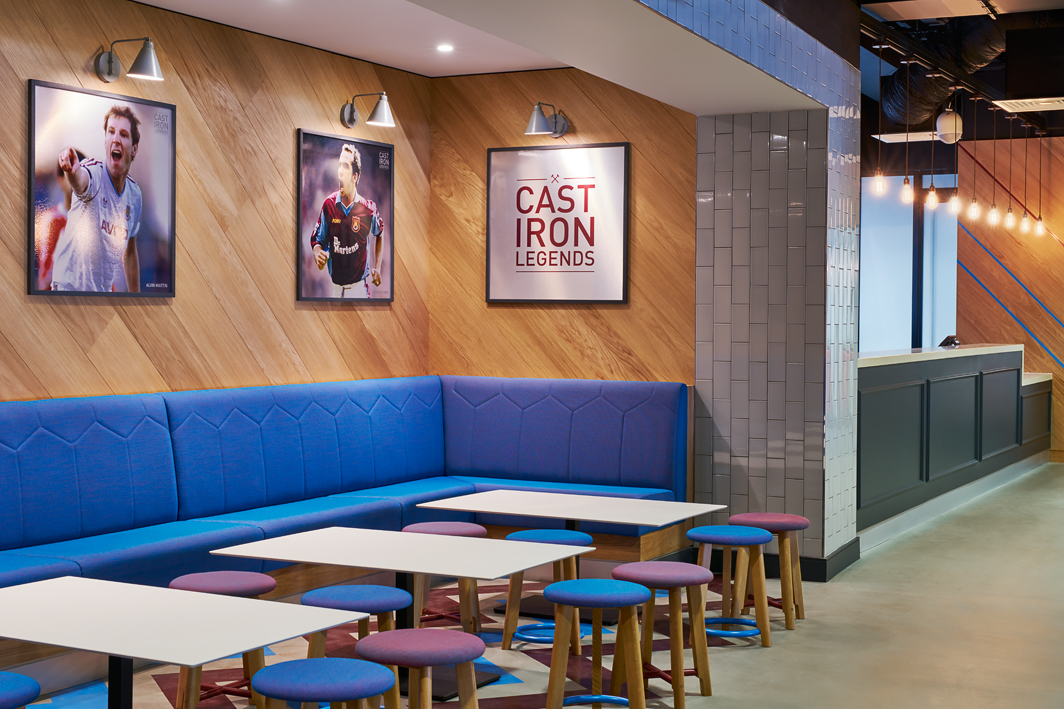 Modern event space at The Boleyn, featuring vibrant seating for networking events.