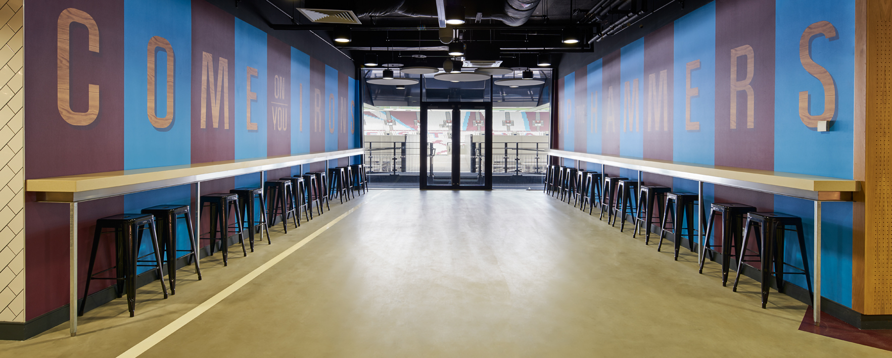 Modern event space at The Boleyn, London Stadium, ideal for networking and gatherings.