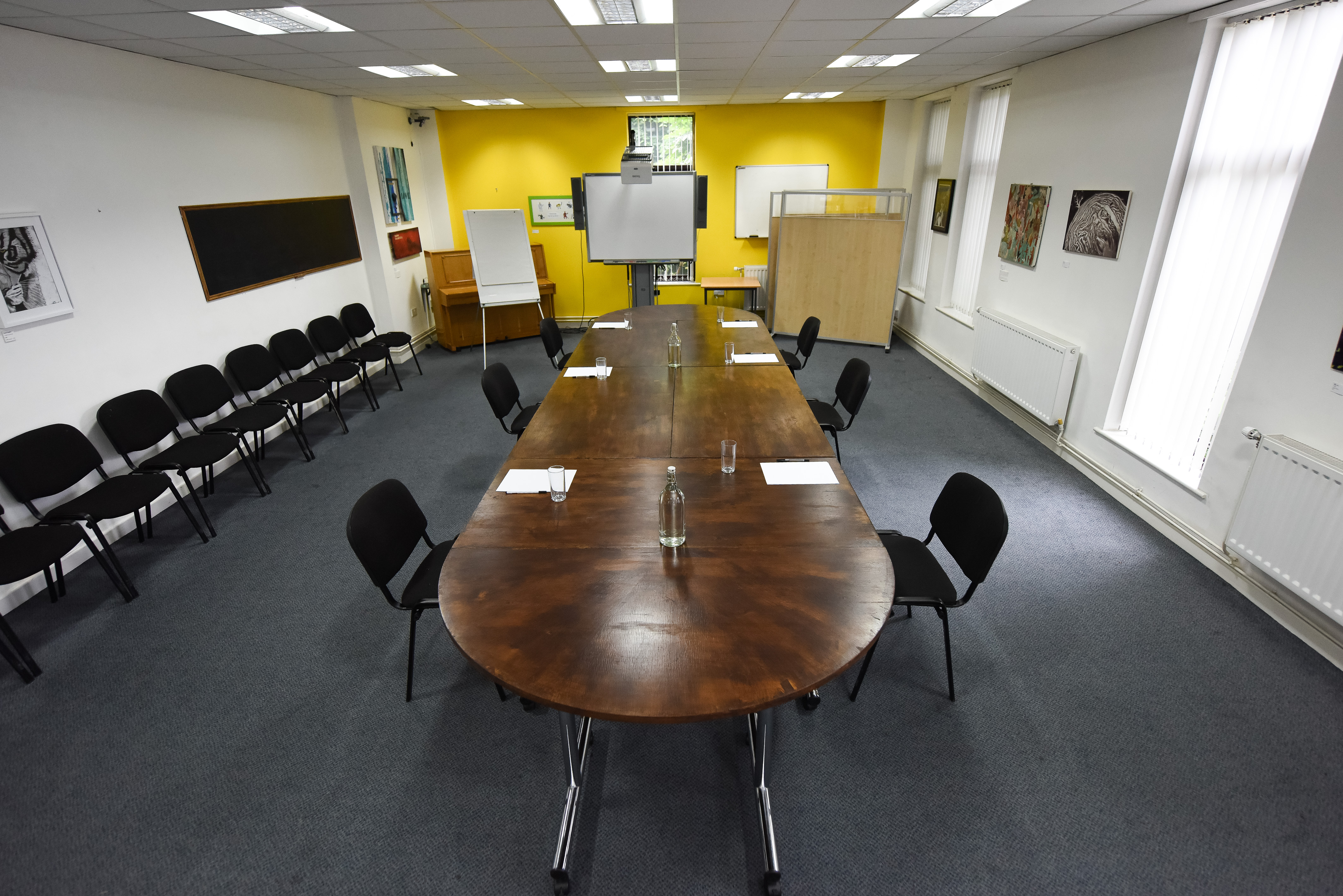 Meeting Room at The Brain Charity with oval table, ideal for collaborative sessions.