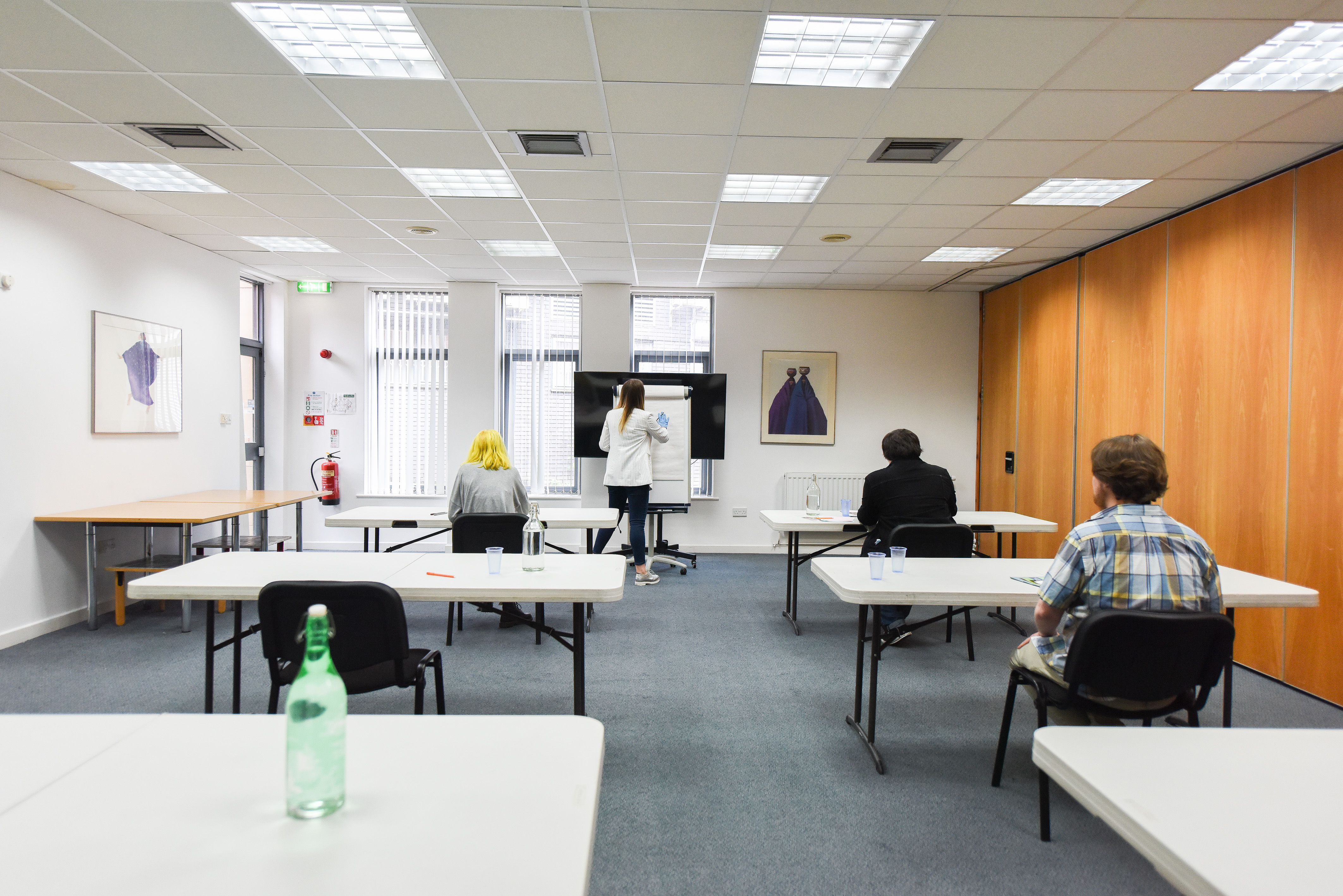 Seminar Room at The Brain Charity, featuring spaced tables for effective presentations.