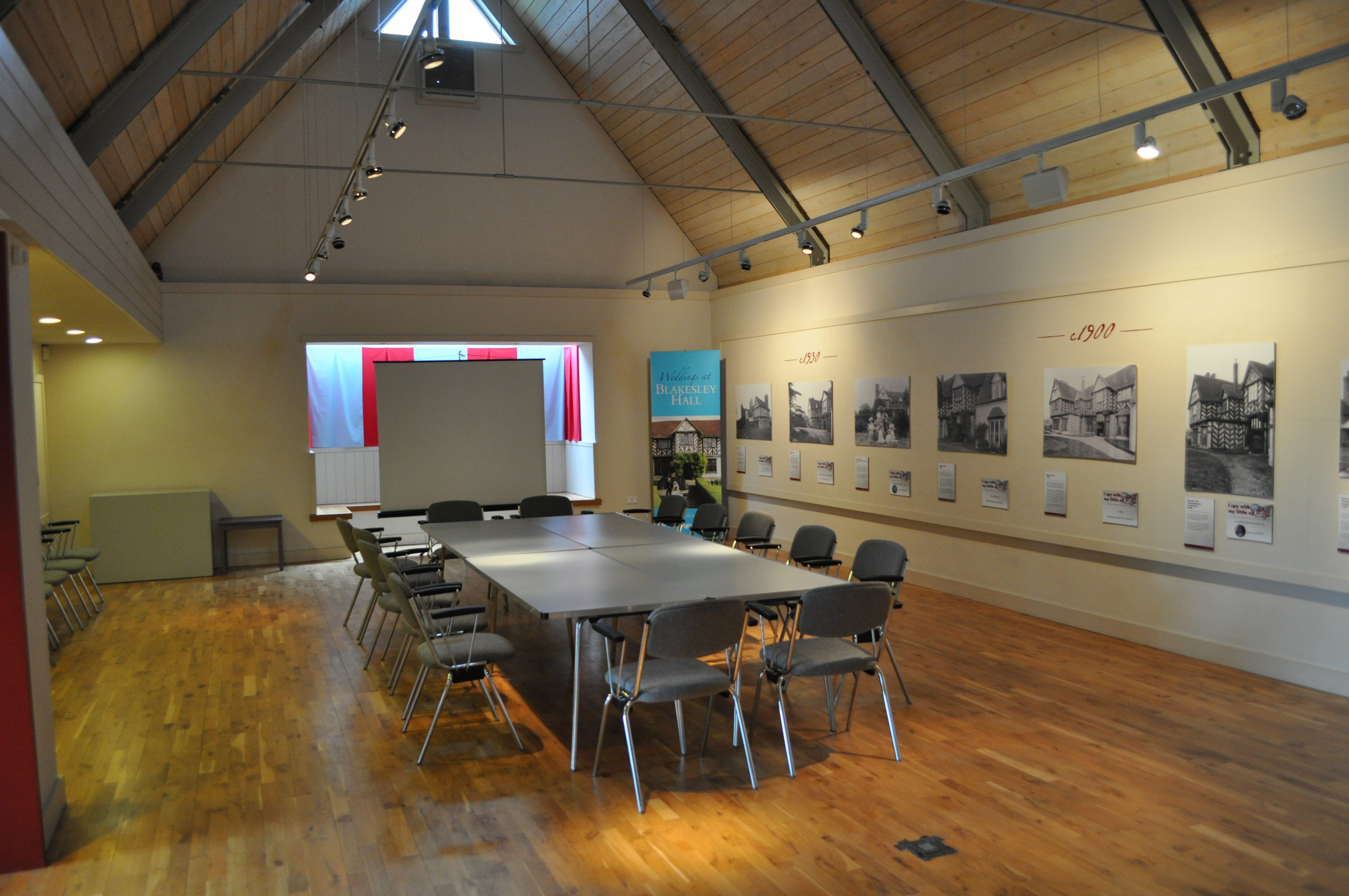Spacious Blakesley Hall meeting room with wooden ceiling, ideal for workshops and planning.