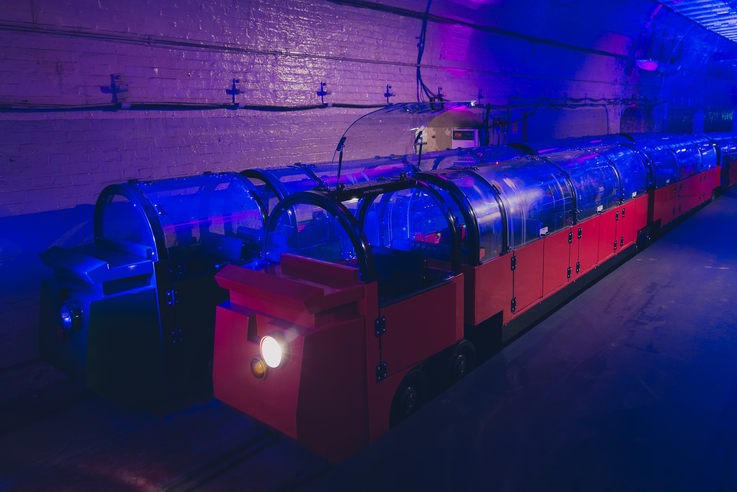 Mail Rail at The Postal Museum: vibrant transport setup for immersive events and marketing.