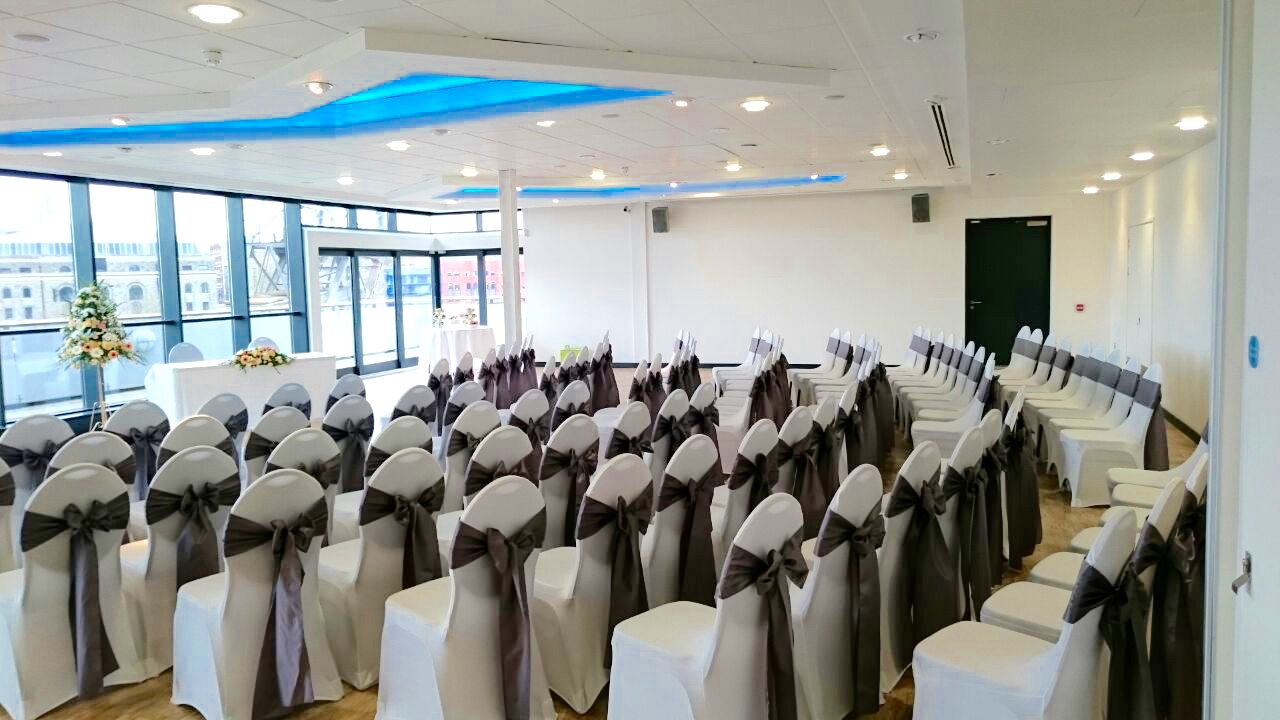 Events Suite in M Shed, elegant chairs for formal gatherings, ideal for conferences and weddings.