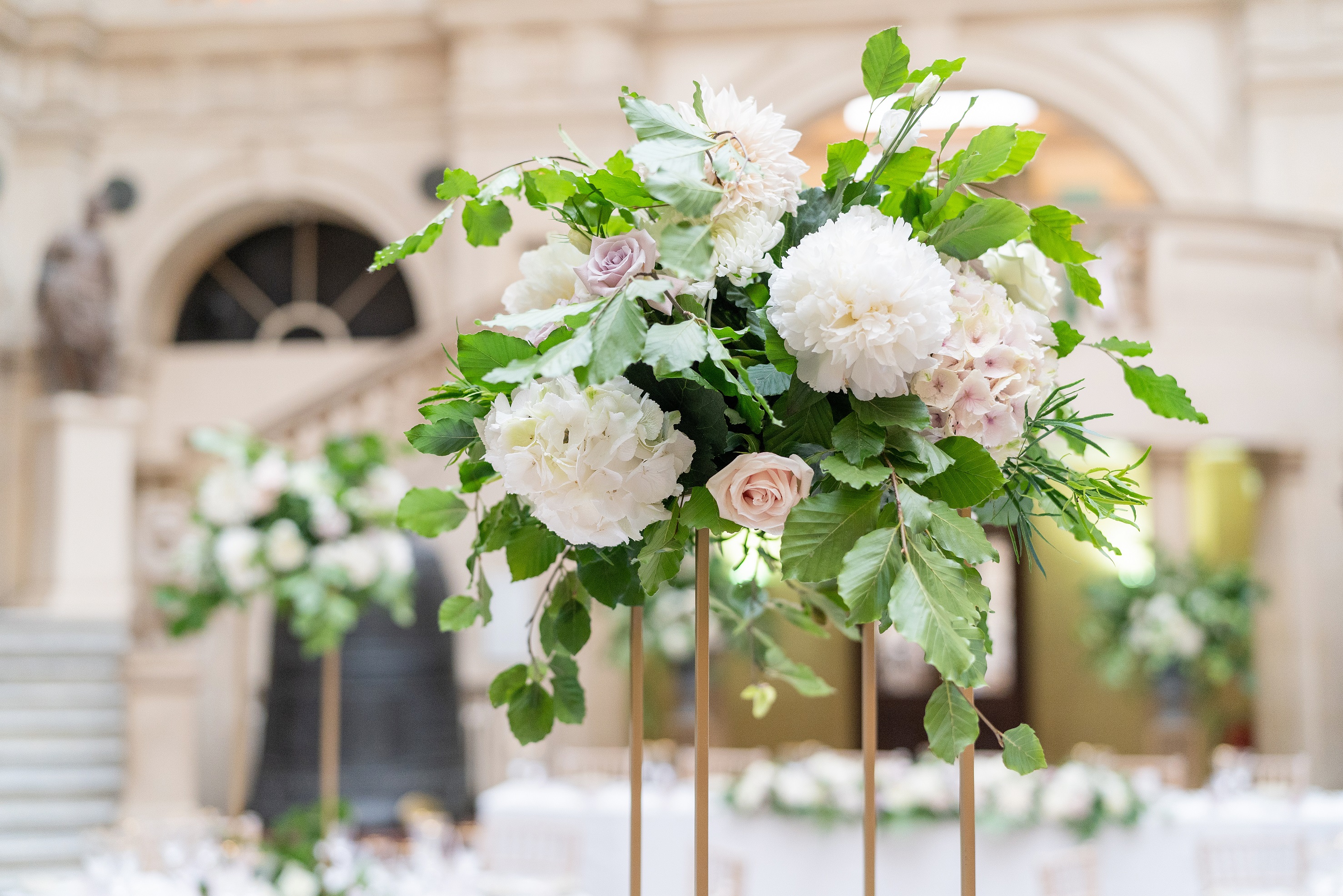 Elegant floral arrangement in Bristol Museum, perfect for weddings and upscale events.