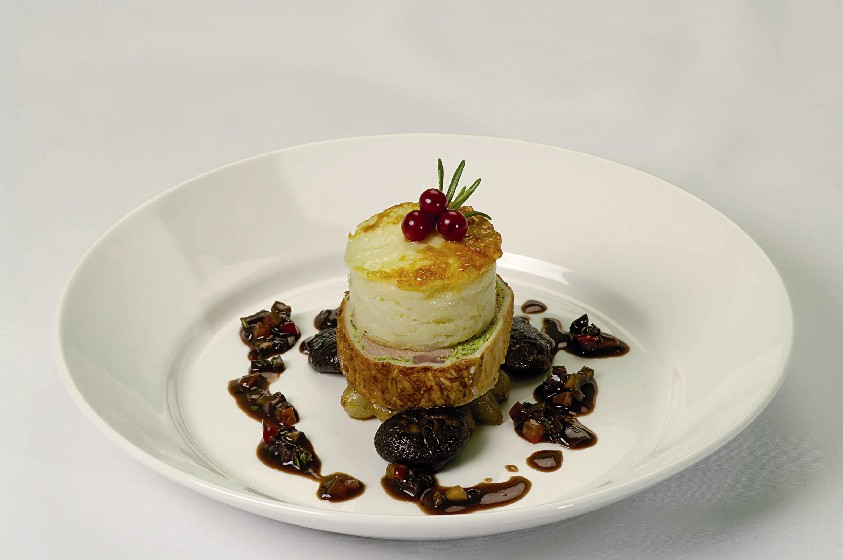 Elegant dish presentation at The National Motor Museum for upscale events.