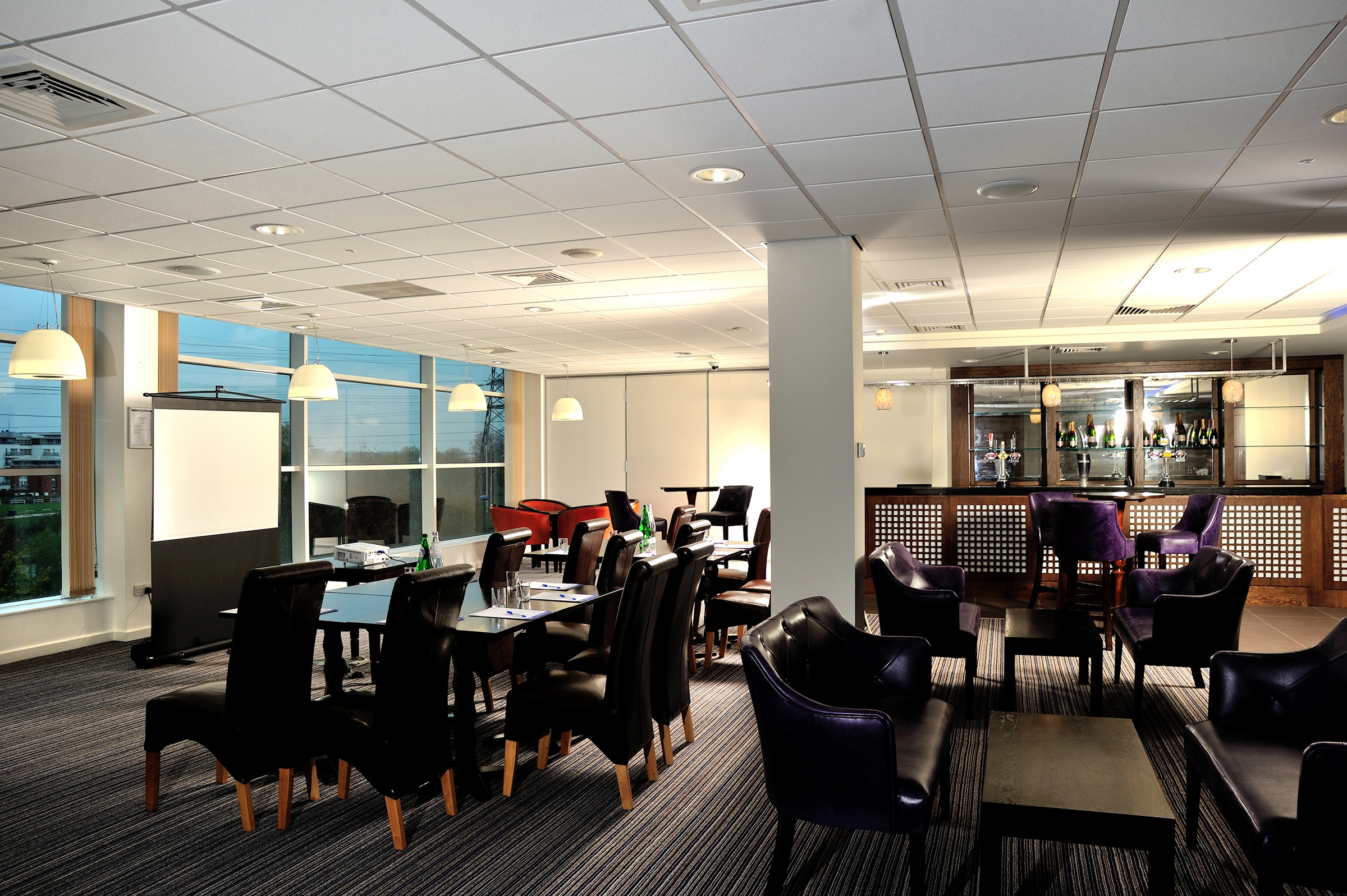 Premier Lounge at Leicester City FC: modern meeting space with natural light for events.