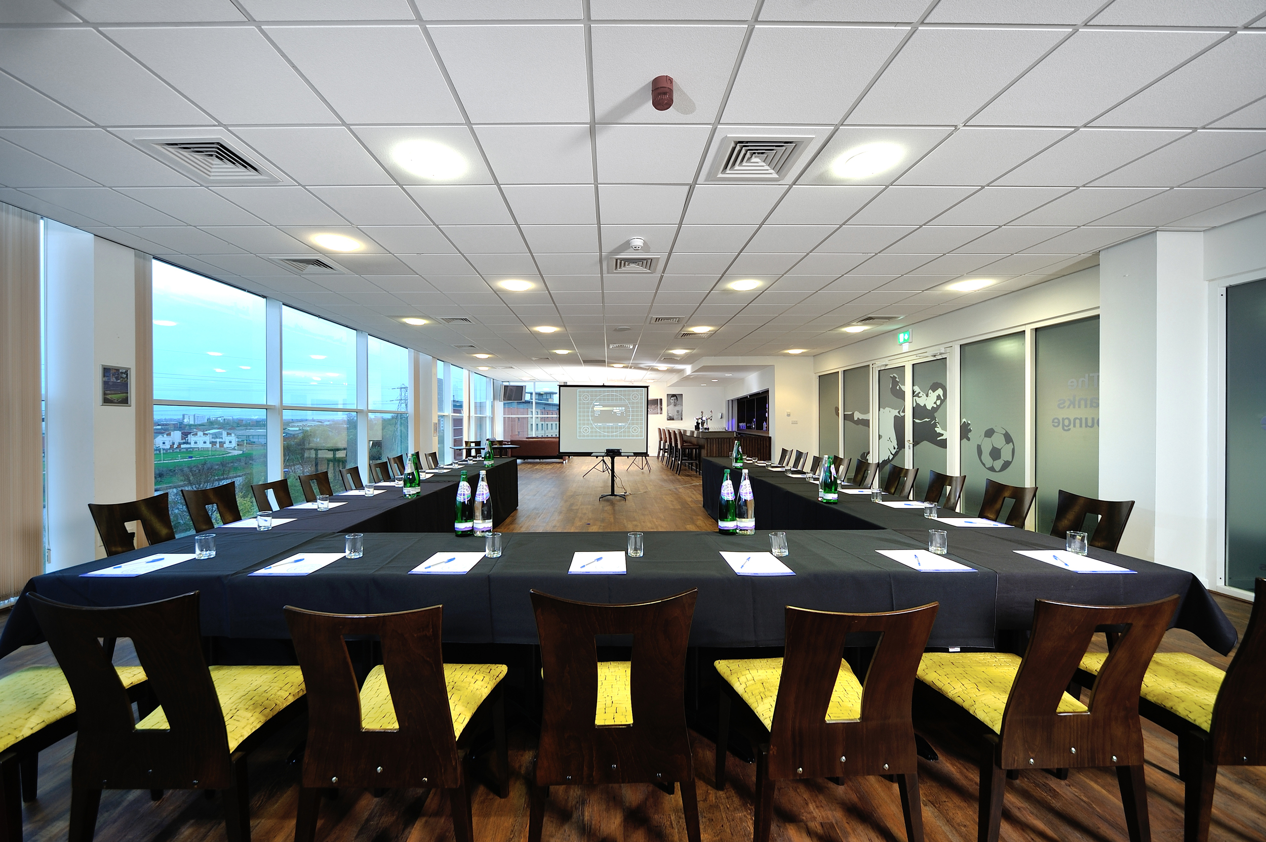 Banks Lounge at Leicester City FC, featuring a professional meeting setup for corporate events.