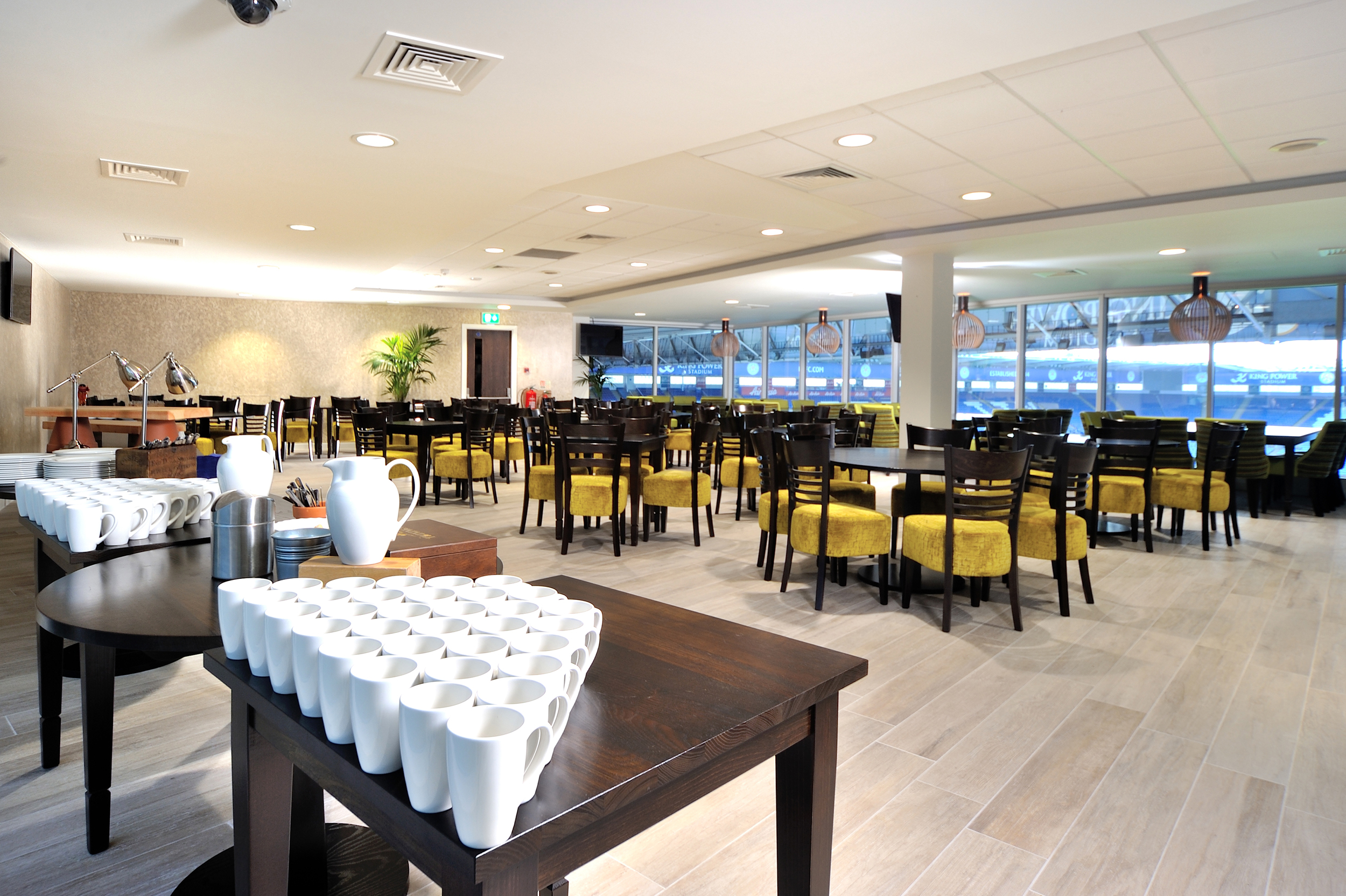 Modern event space at Leicester City FC with natural light, ideal for corporate gatherings.