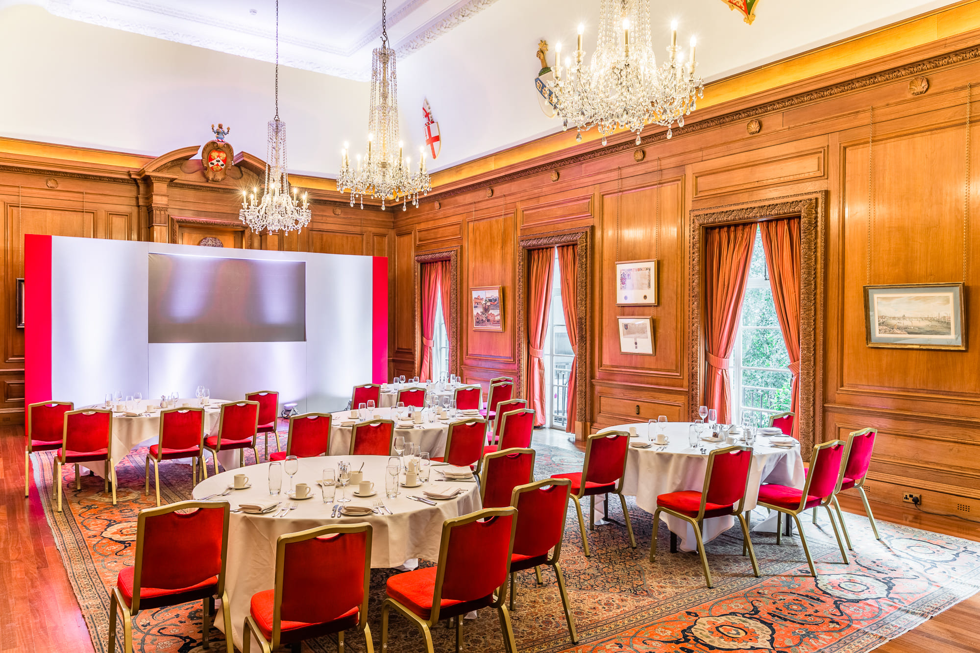 Elegant meeting space in Brewers Hall with wooden paneling, ideal for corporate events.