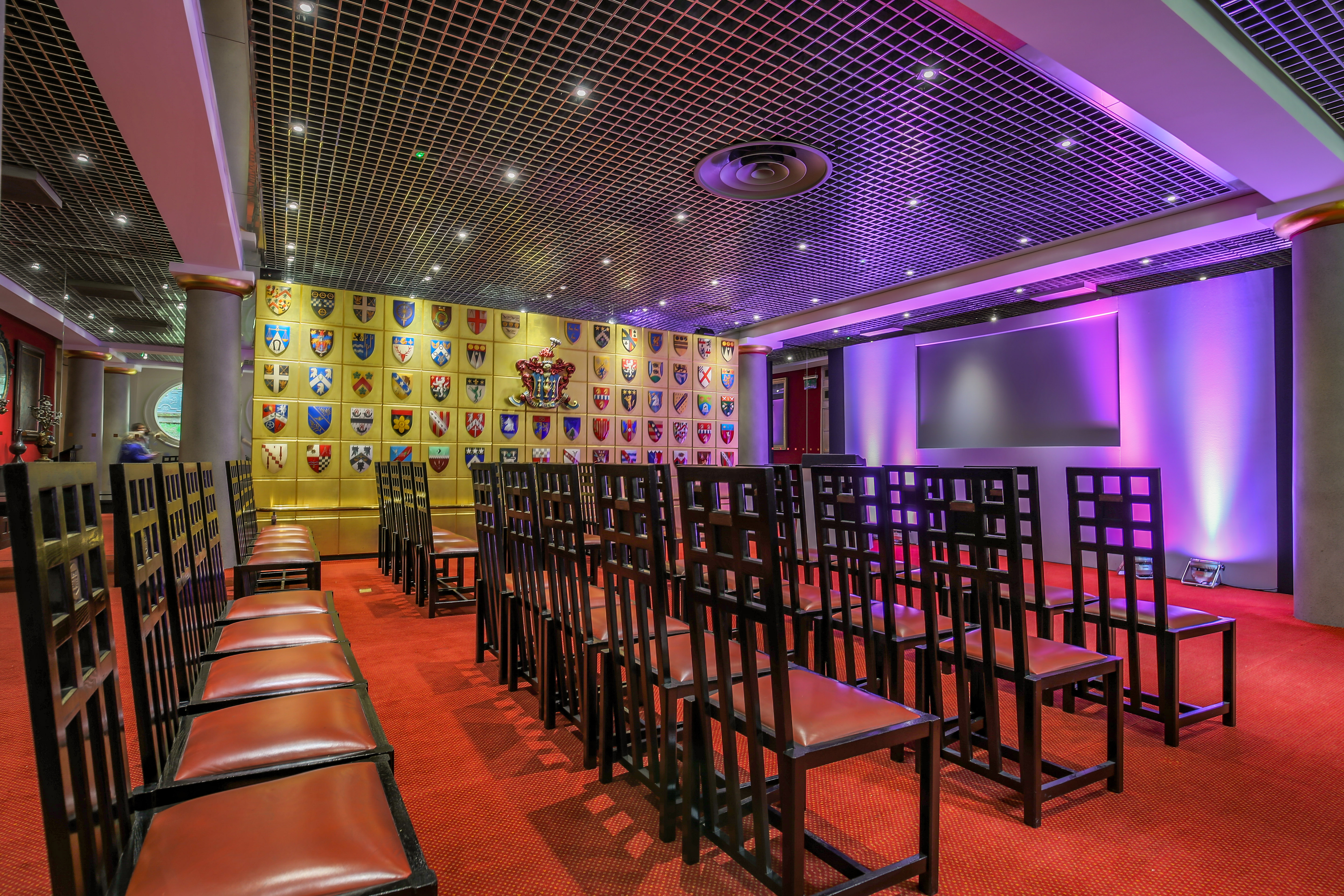 Livery Hall event space with elegant chairs, perfect for corporate meetings and presentations.