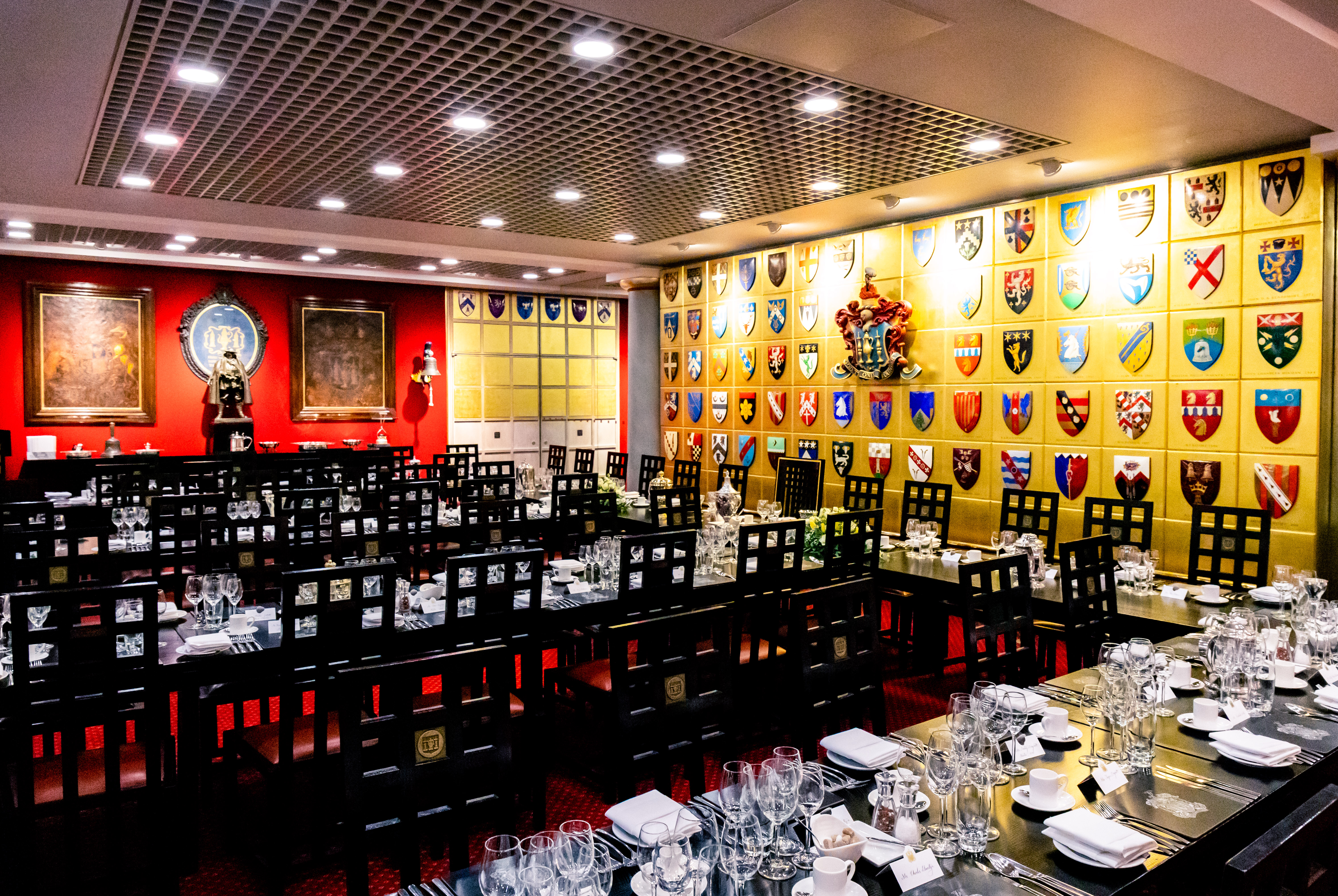 Elegant Livery Hall with shield wall, perfect for corporate events and formal gatherings.