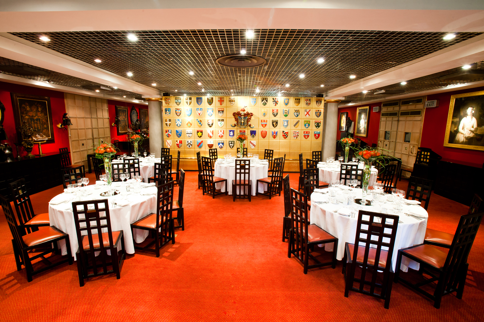 Livery Hall event space with round tables, elegant decor for corporate gatherings.