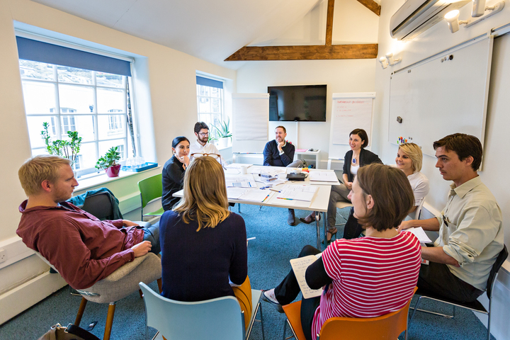 Collaborative meeting space at Wallacespace St Pancras with circular seating and natural light.