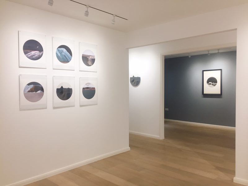 Modern event space in Arthill Gallery with framed artworks, ideal for art exhibitions and receptions.