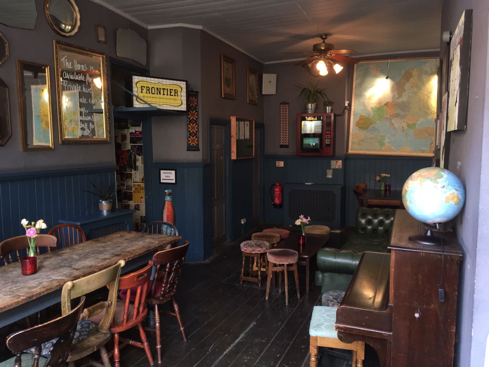 Cozy Whole Pub venue with rustic decor for meetings and gatherings.