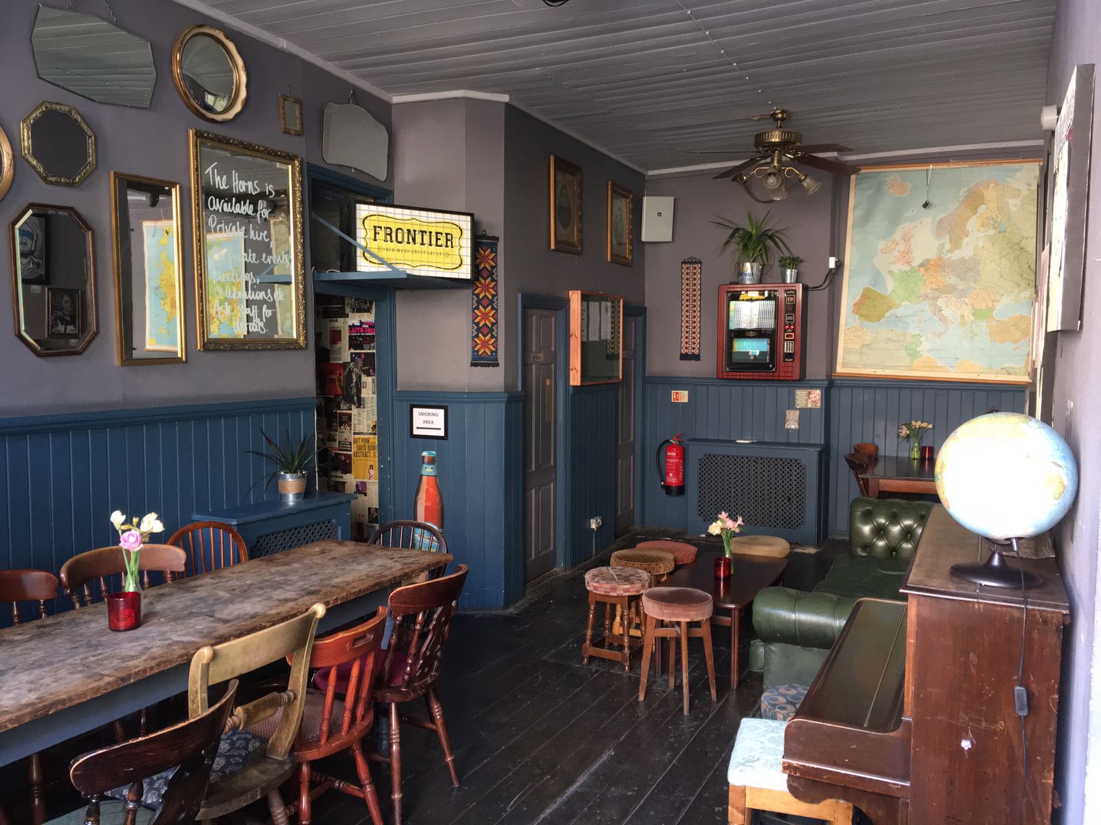 Cozy vintage meeting space at Whole Pub, ideal for intimate workshops and gatherings.