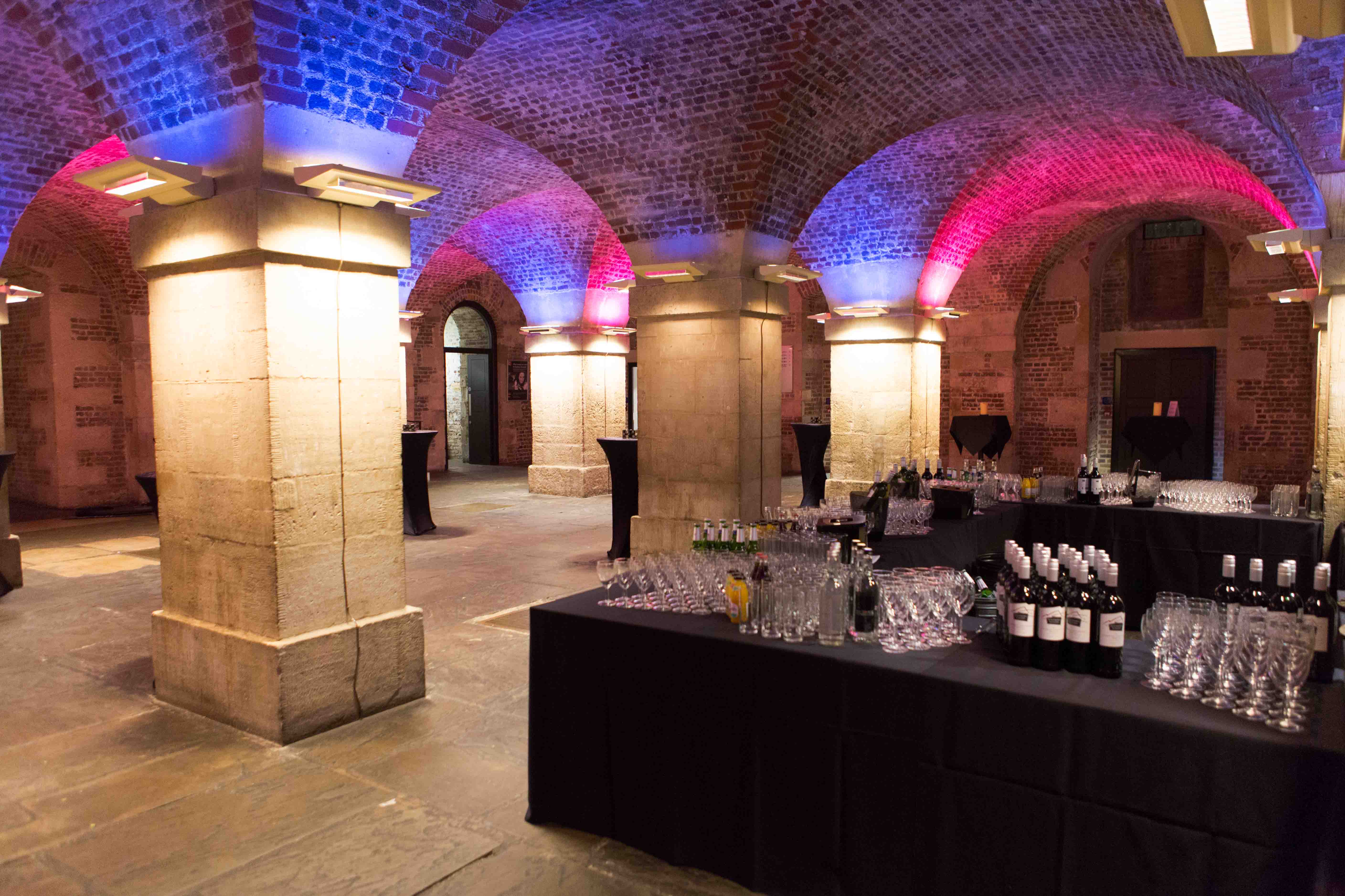 Stylish event space in St Martin-in-the-Fields with exposed brick and elegant lighting.
