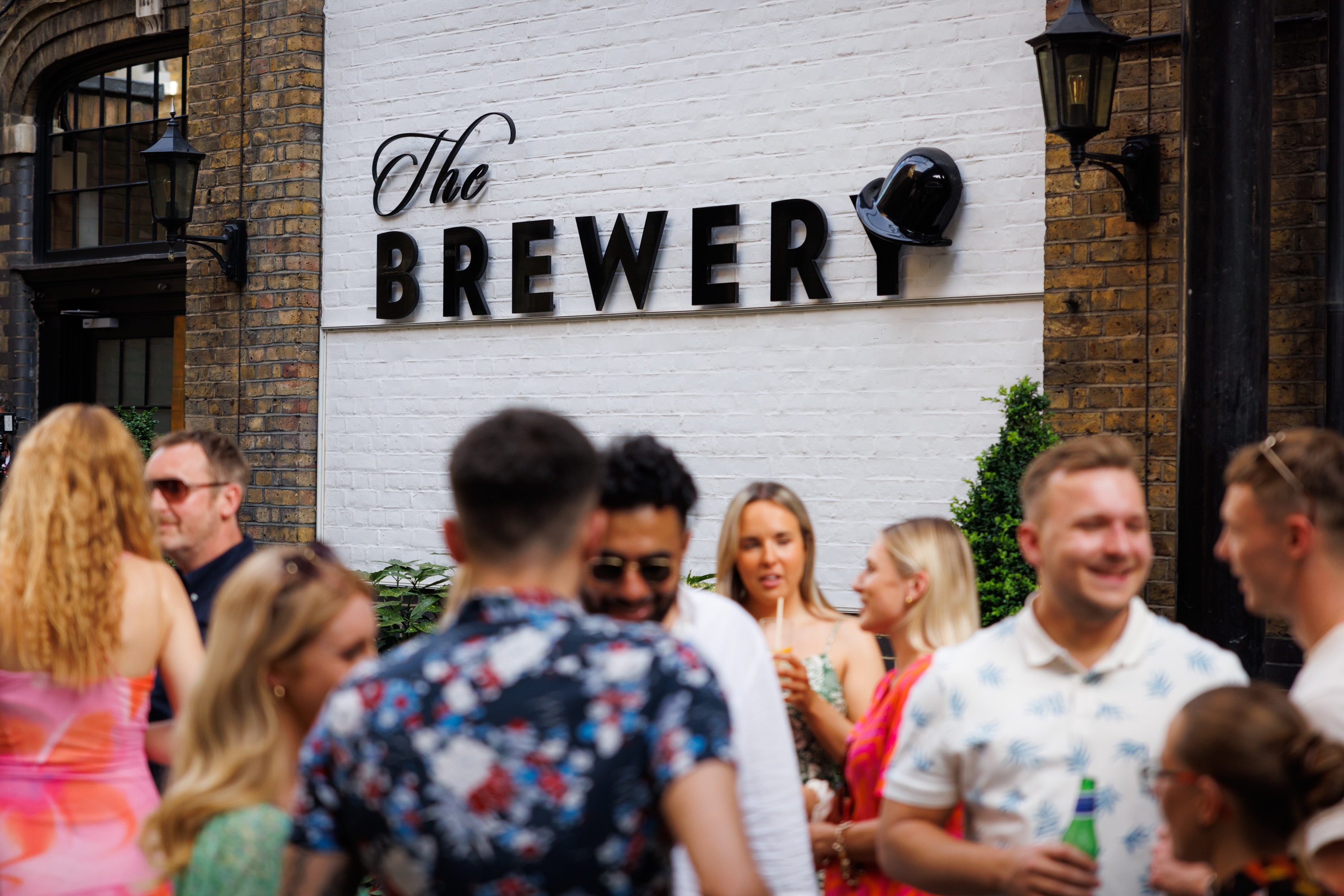 Vibrant outdoor summer party at The Brewery, perfect for networking and socializing.