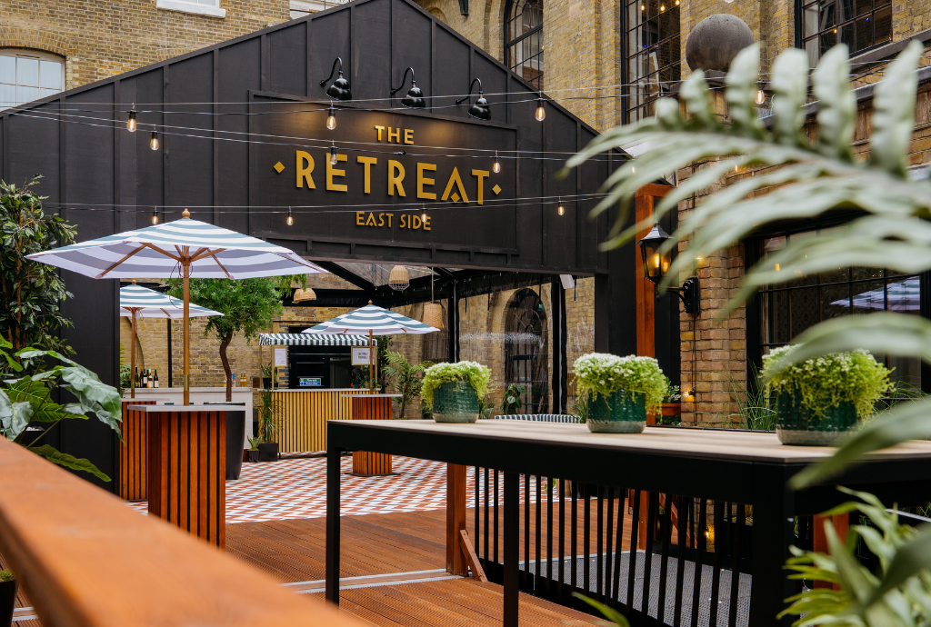 Stylish outdoor venue at The Retreat summer party, ideal for events and networking.