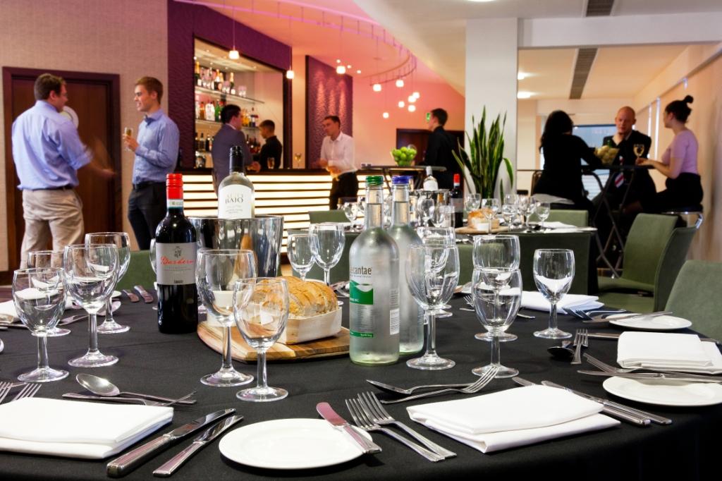 "Premier Suite at Reading FC: elegant dining setup for corporate events and gatherings"