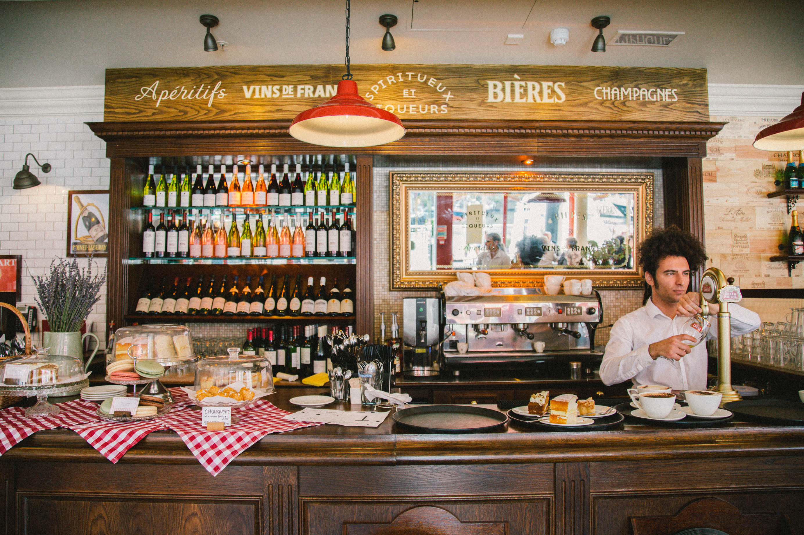 Charming bar setup at Café Rouge for networking events with quality catering.