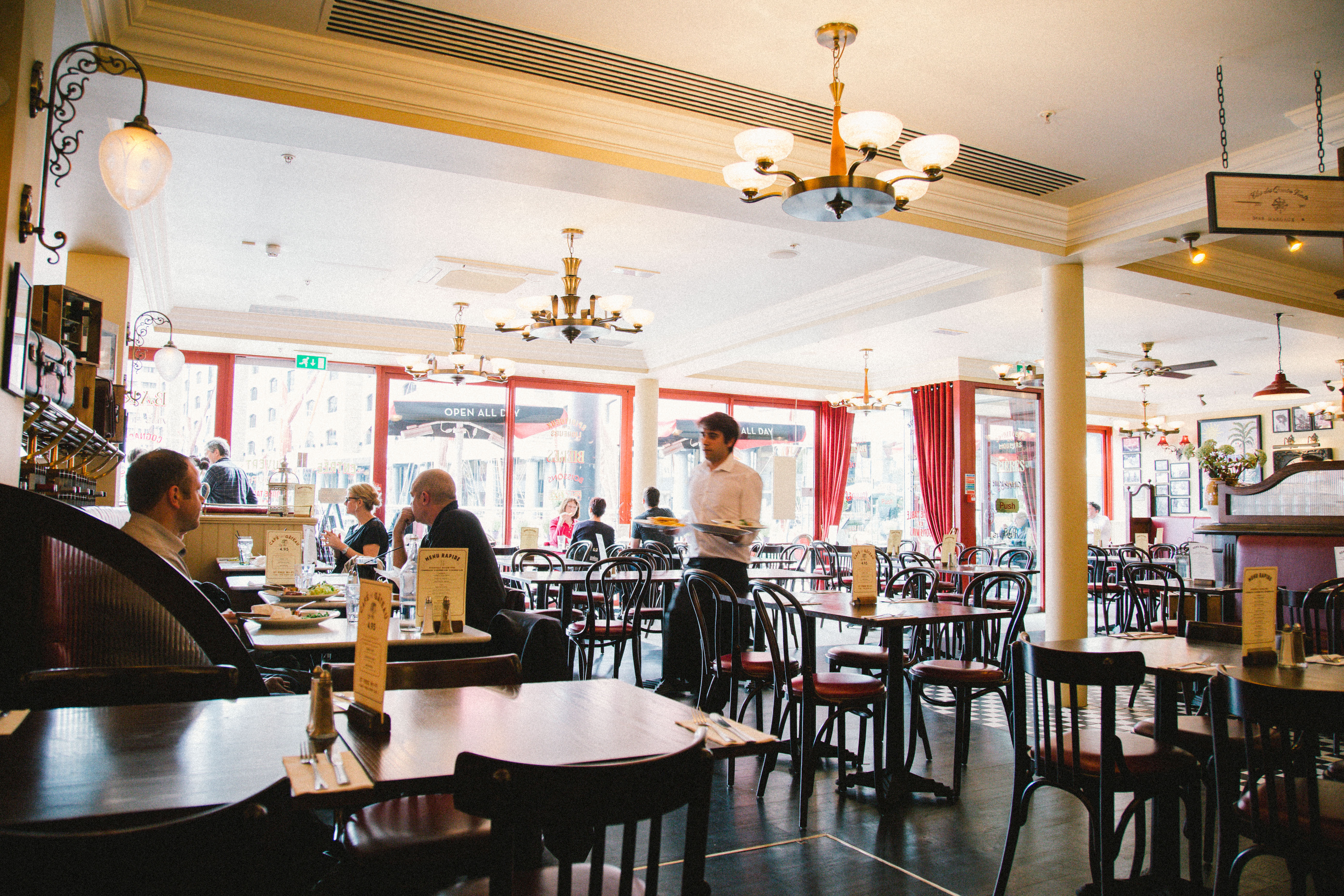 Spacious Café Rouge venue with natural light, perfect for meetings and events.