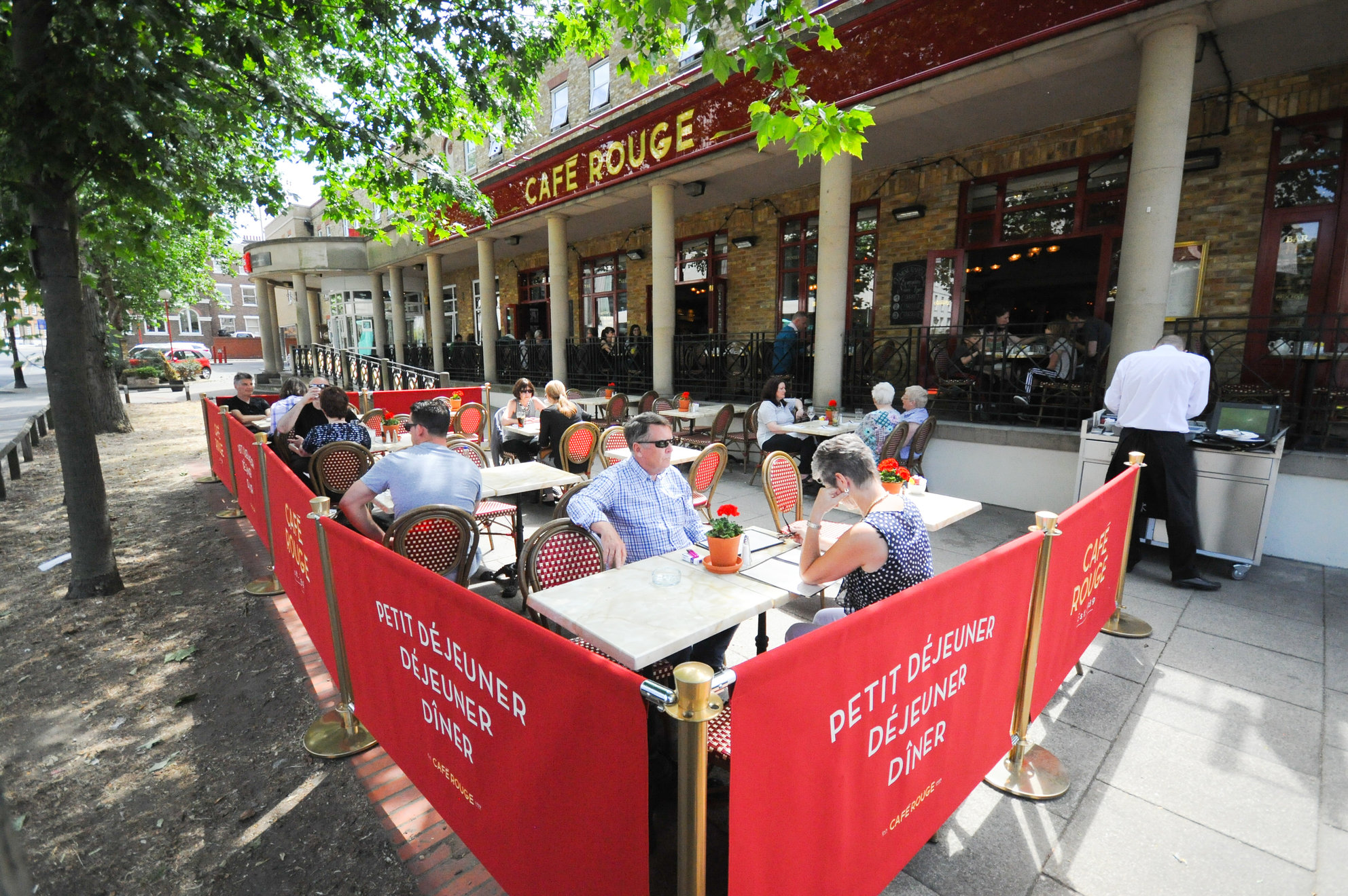 Outdoor dining area at Café Rouge Greenwich, ideal for summer networking events.