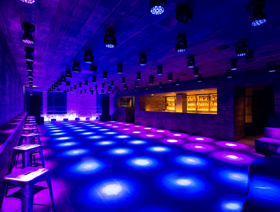 Versatile event space at The London EDITION with dynamic lighting for corporate and social events.