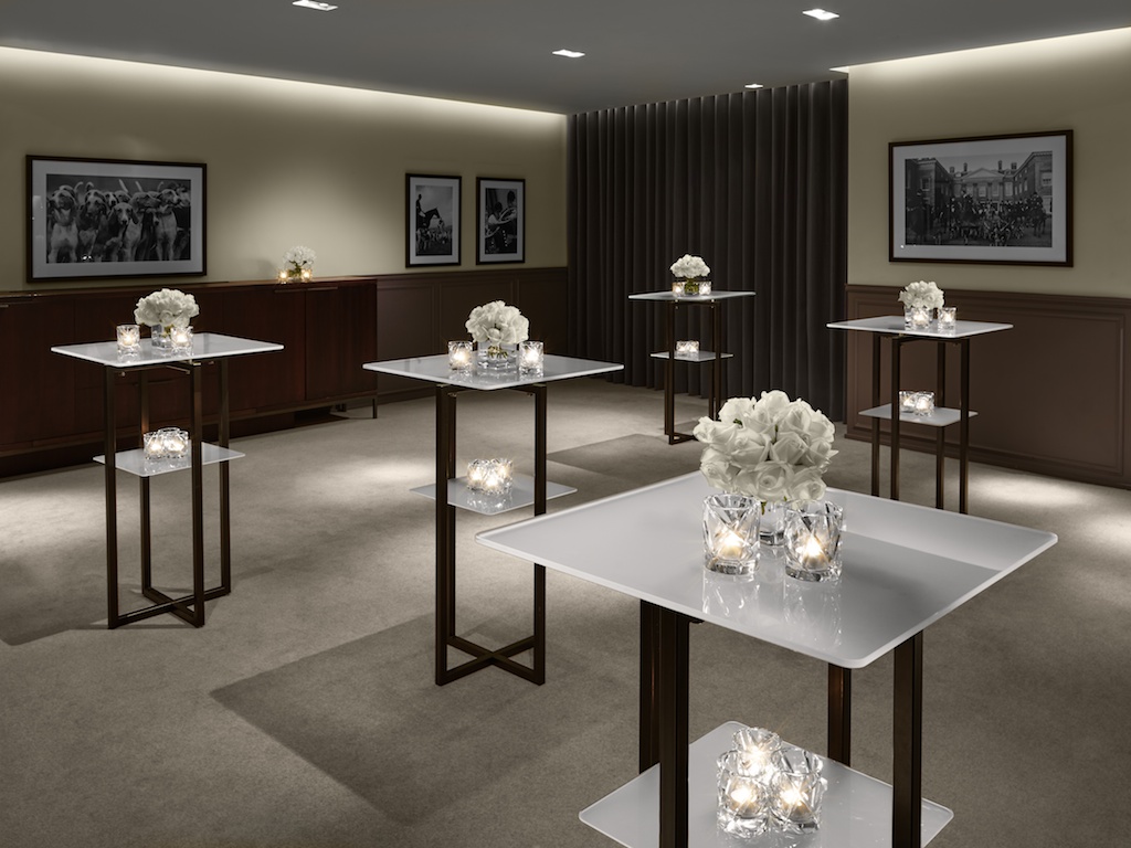 Sophisticated event space with high-top tables, ideal for networking and cocktail receptions.