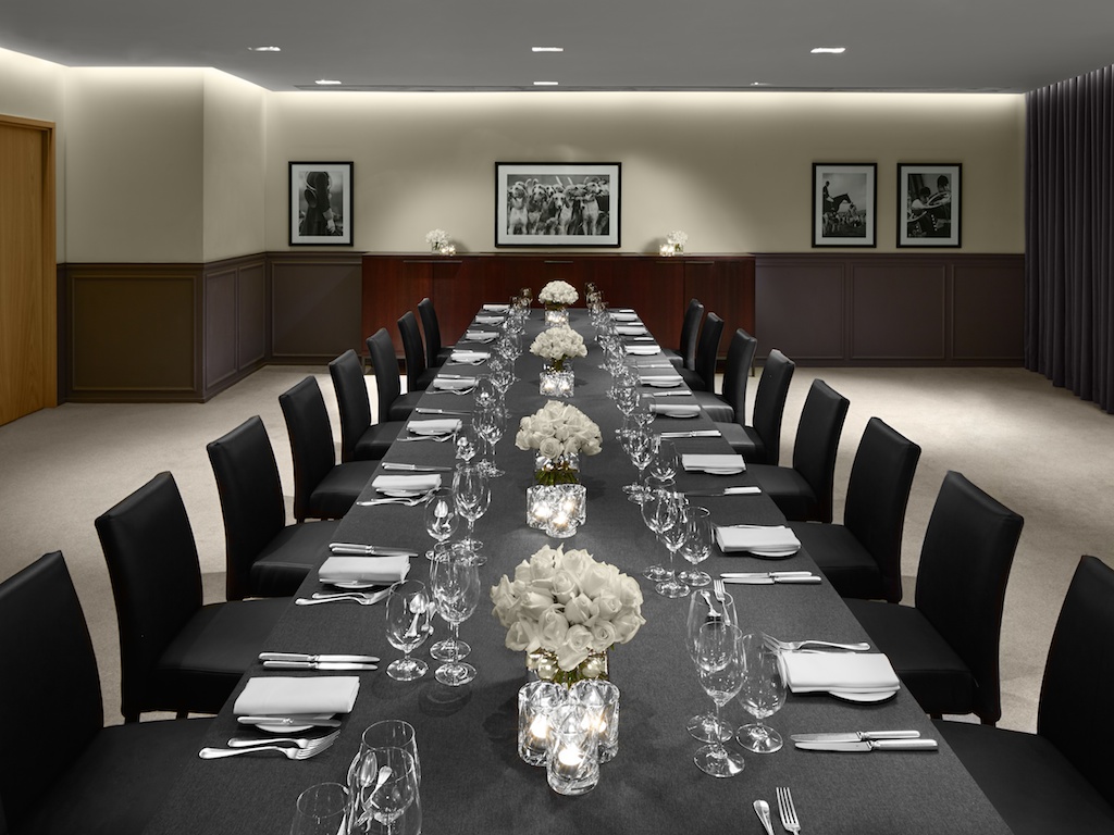 Sophisticated banquet setup in Studio II, The London EDITION for corporate events.